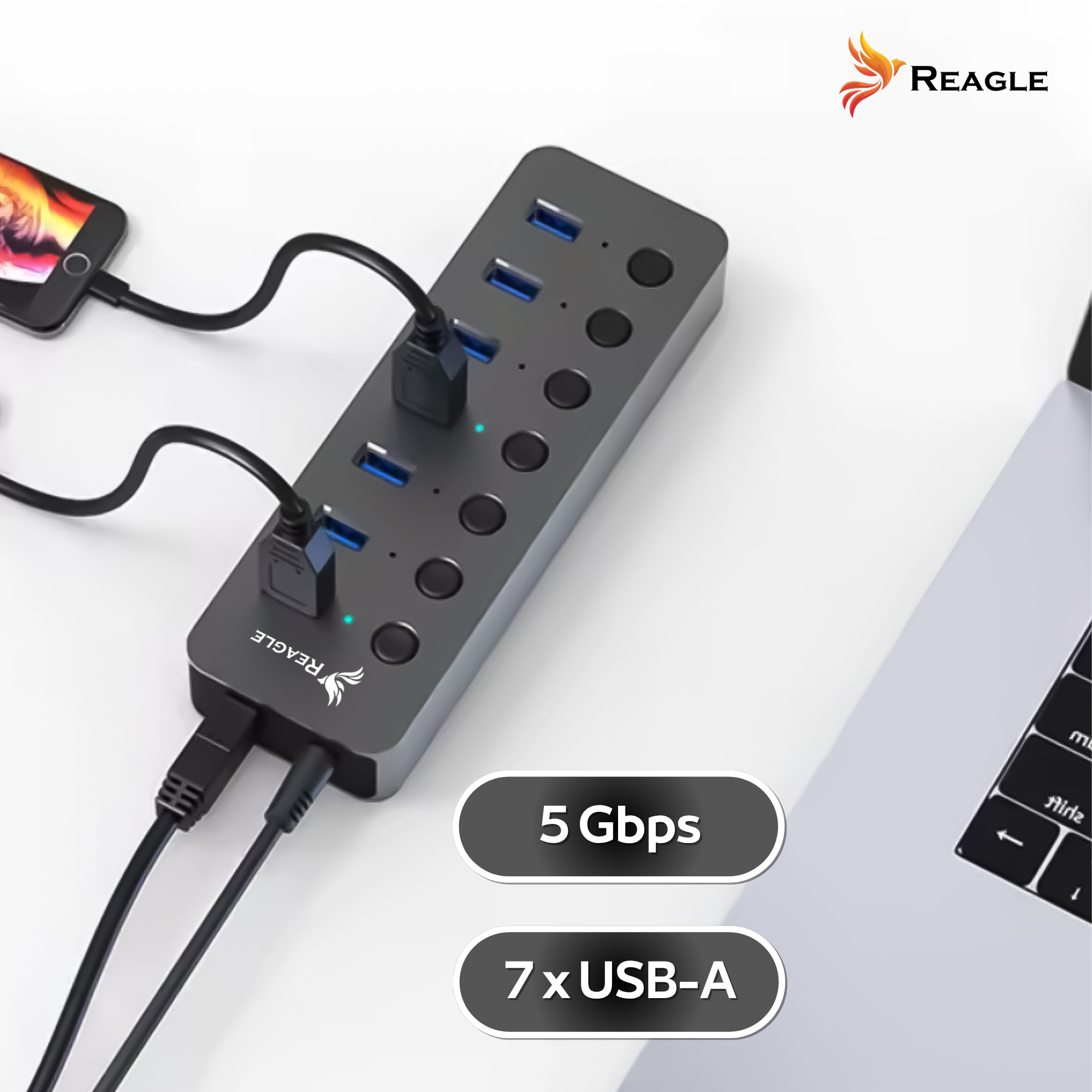 Szary hub USB z podłączonymi kablami, telefonem i laptopem. Tekst: 5 Gbps, 7x USB-A. Logo Reagle.
