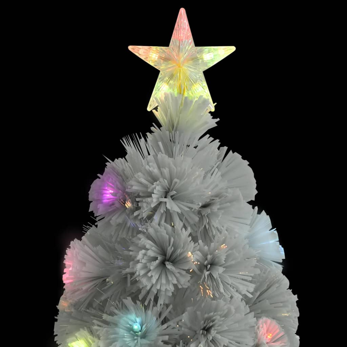 Ein weißer Weihnachtsbaum mit einem Sternaufsatz. Der Stern leuchtet in mehreren Farben. Der Baum steht vor schwarzem Hintergrund.