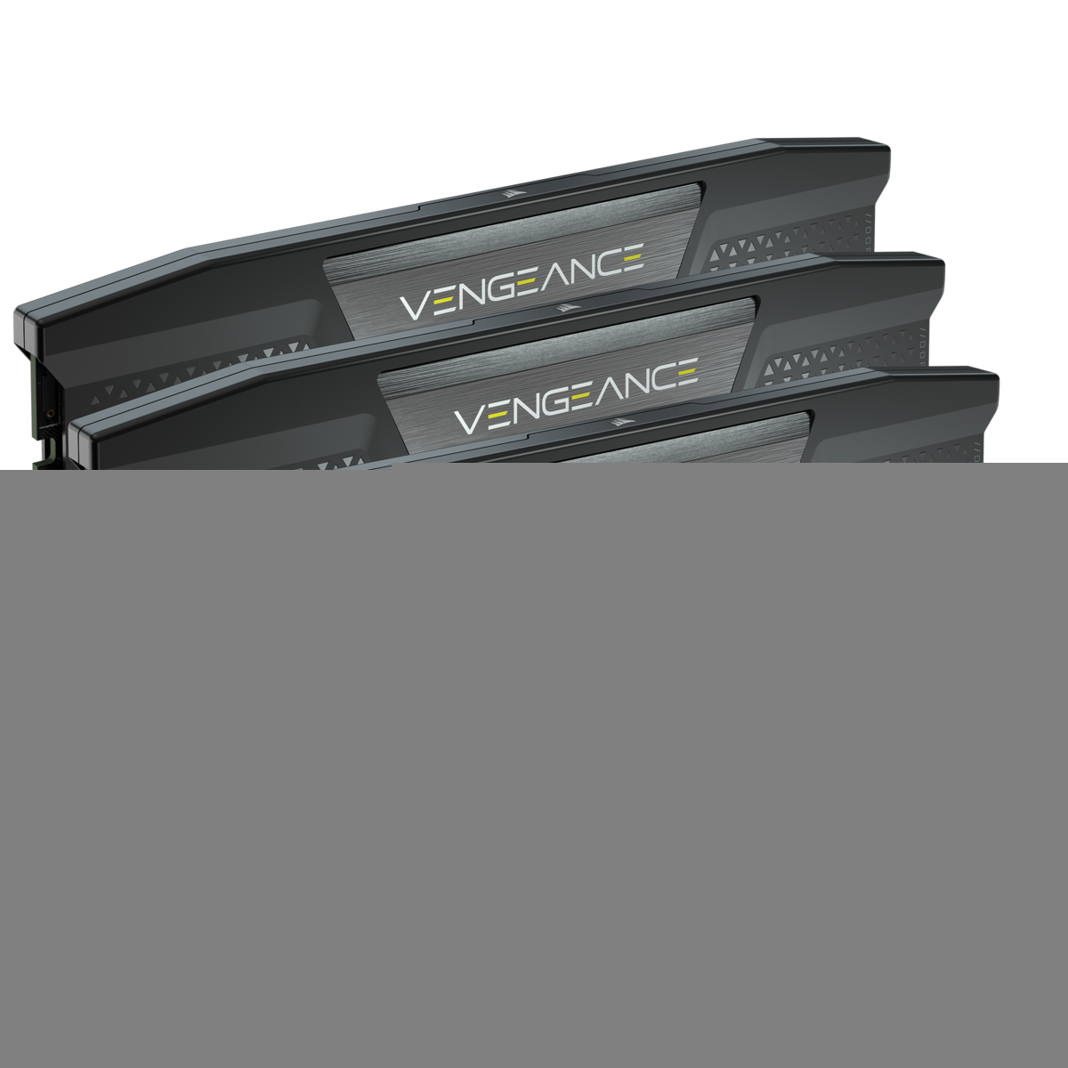 Trzy czarne moduły pamięci komputera ze słowem 'VENGEANCE'. Tło jest białe.