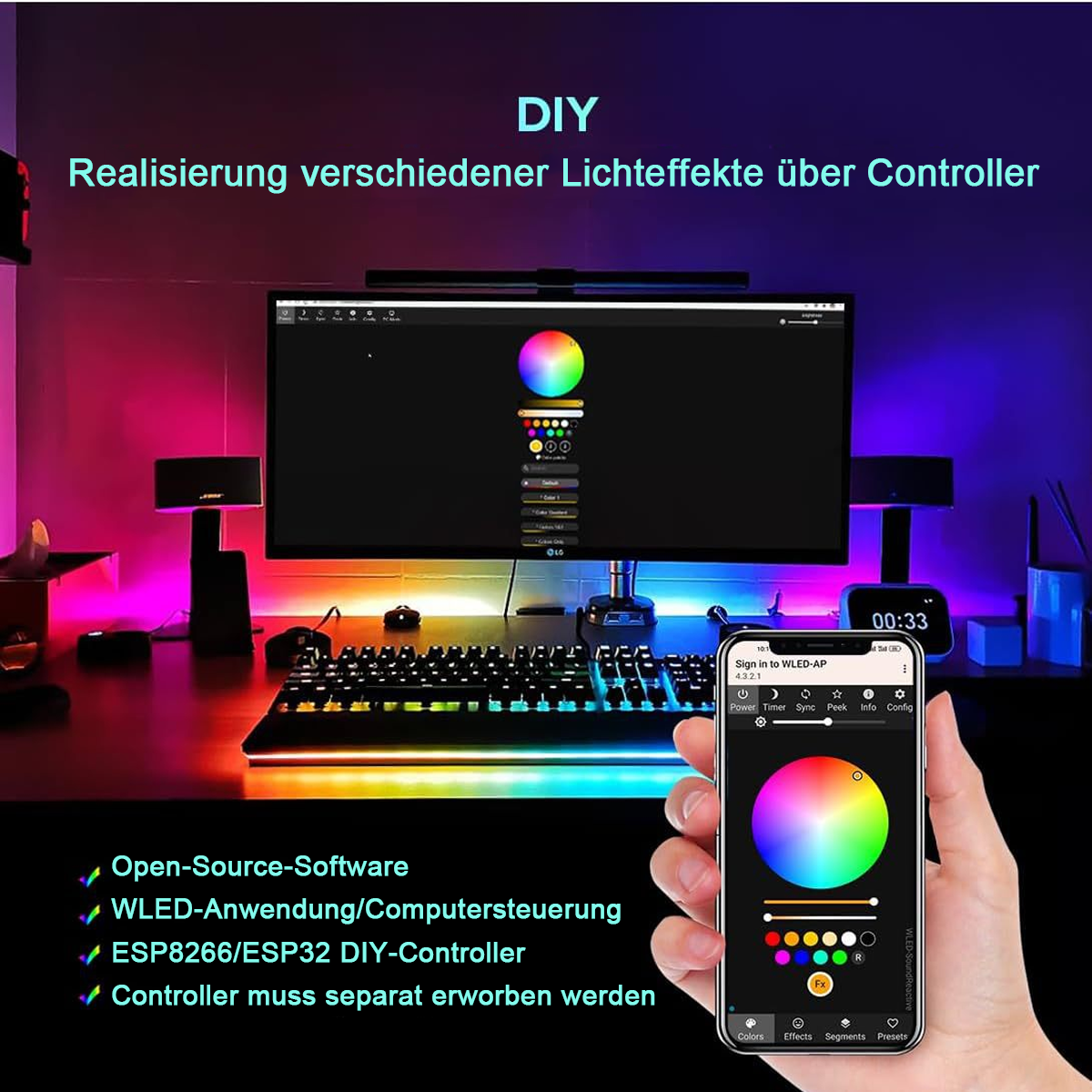 Eine Hand mit einem Telefon steuert farbige Lichter. Ein Computermonitor zeigt ein Farbrad. Tastatur und andere Geräte auf dem Schreibtisch.