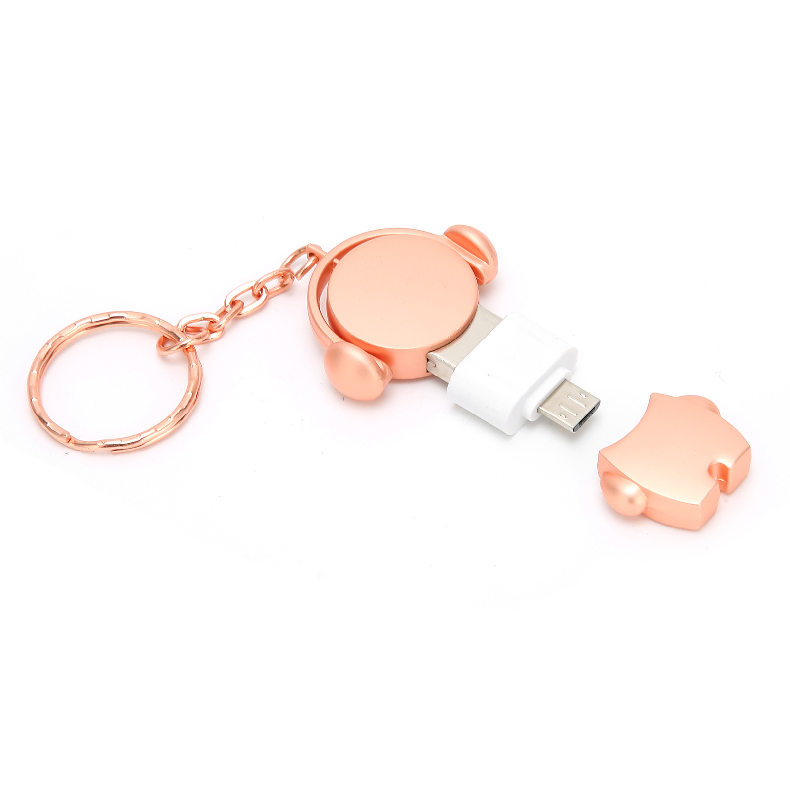 Ein roségoldener USB-Stick in Bärenform mit abgelöstem Teil und Kette auf weißem Hintergrund.