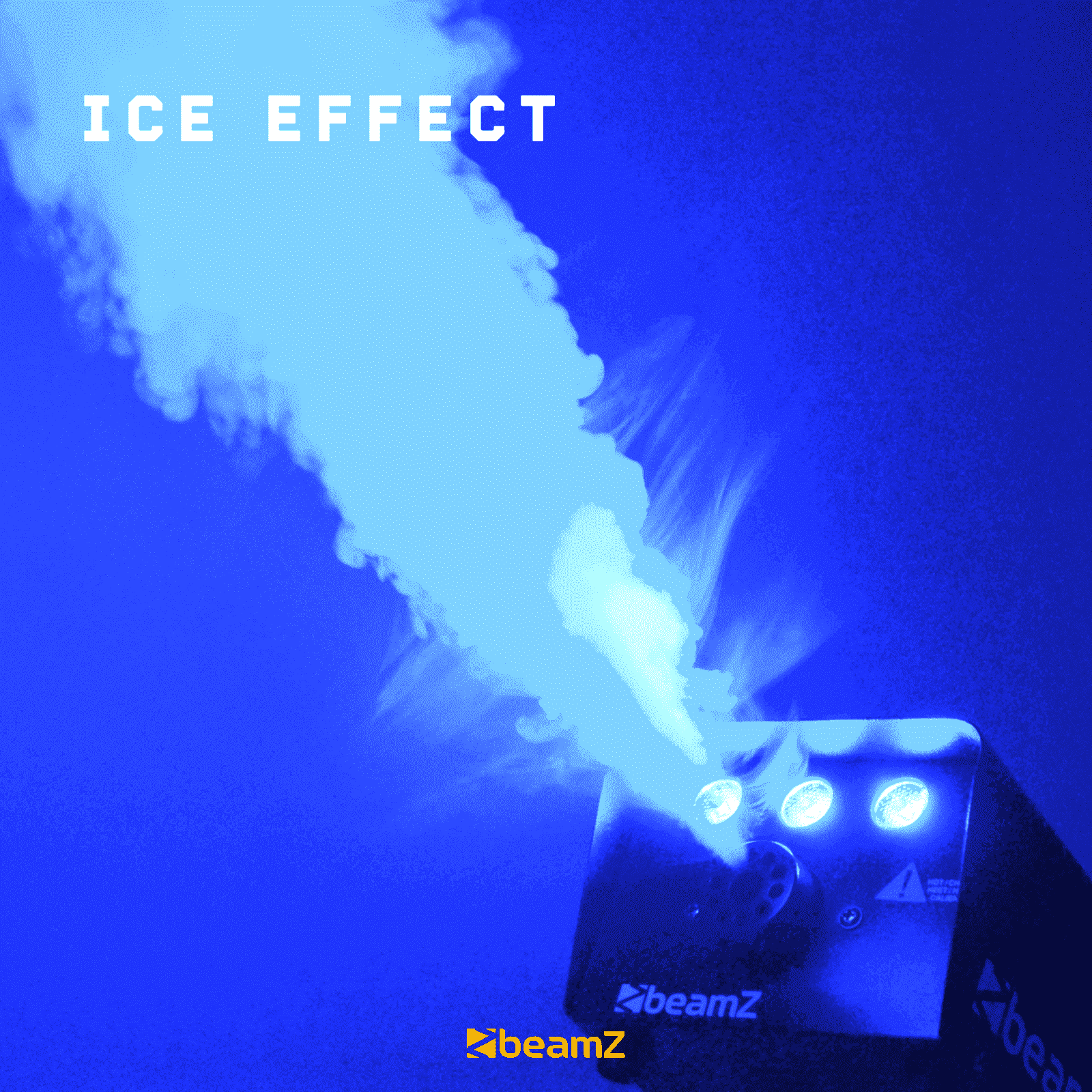 Una máquina azul de efecto hielo emite una nube de niebla blanca. La palabra 'ICE EFFECT' está arriba. El logo es 'beamz'.