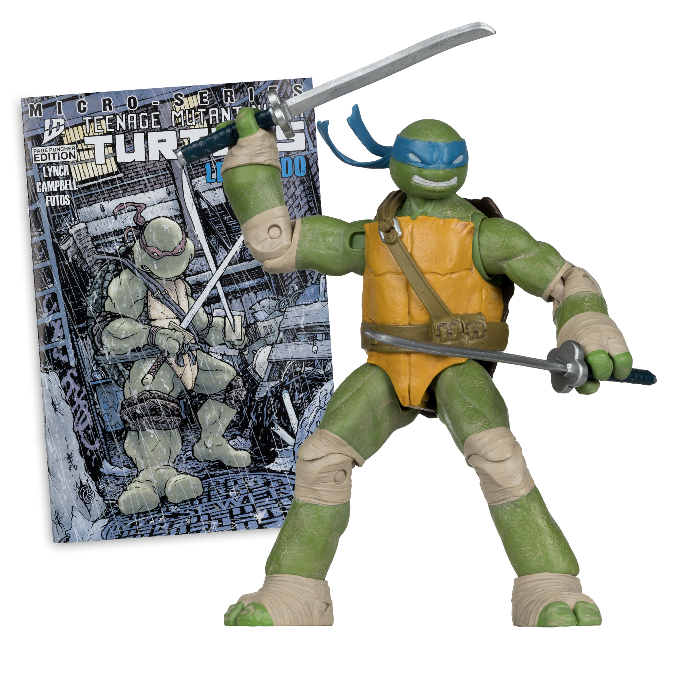 Eine Teenage Mutant Ninja Turtle-Actionfigur mit zwei Schwertern neben einem Comic-Cover.