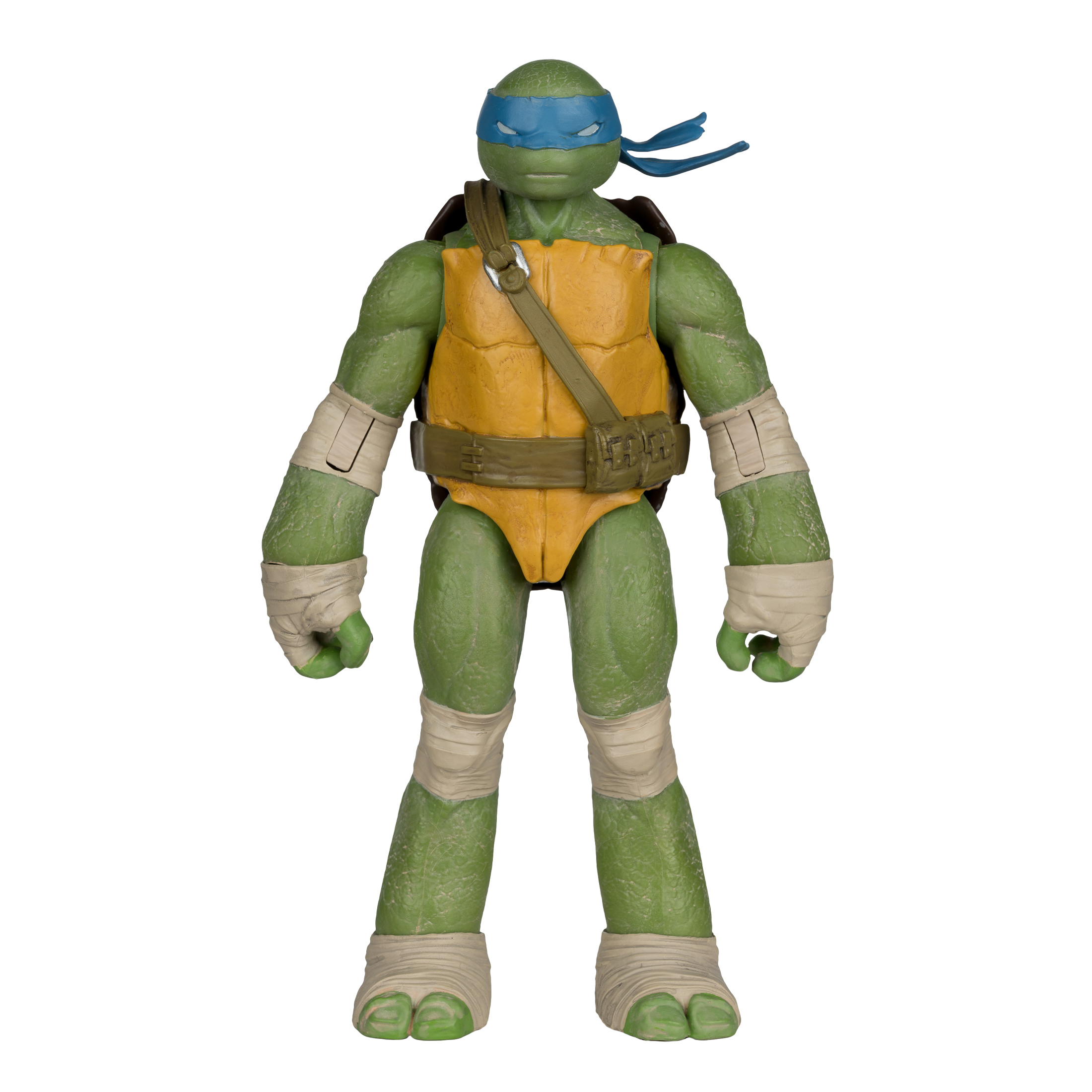 Ein Teenage Mutant Ninja Turtle-Spielzeug. Es ist grün mit einer blauen Maske. Es trägt einen gelben Gürtel und Brustschutz.