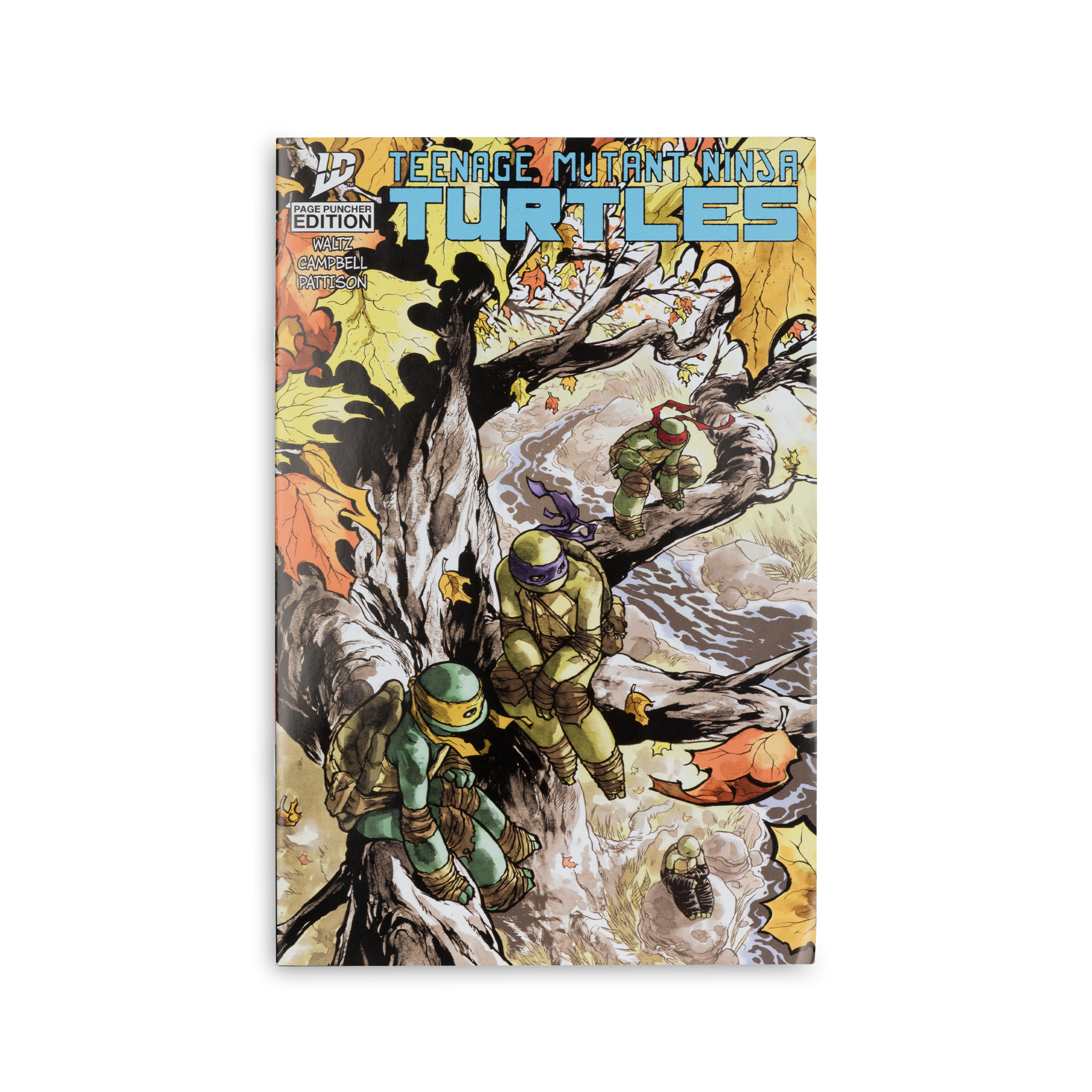 Comic-Cover von Teenage Mutant Ninja Turtles, vier Schildkröten in einem Baum, Herbstblätter. Titel oben.