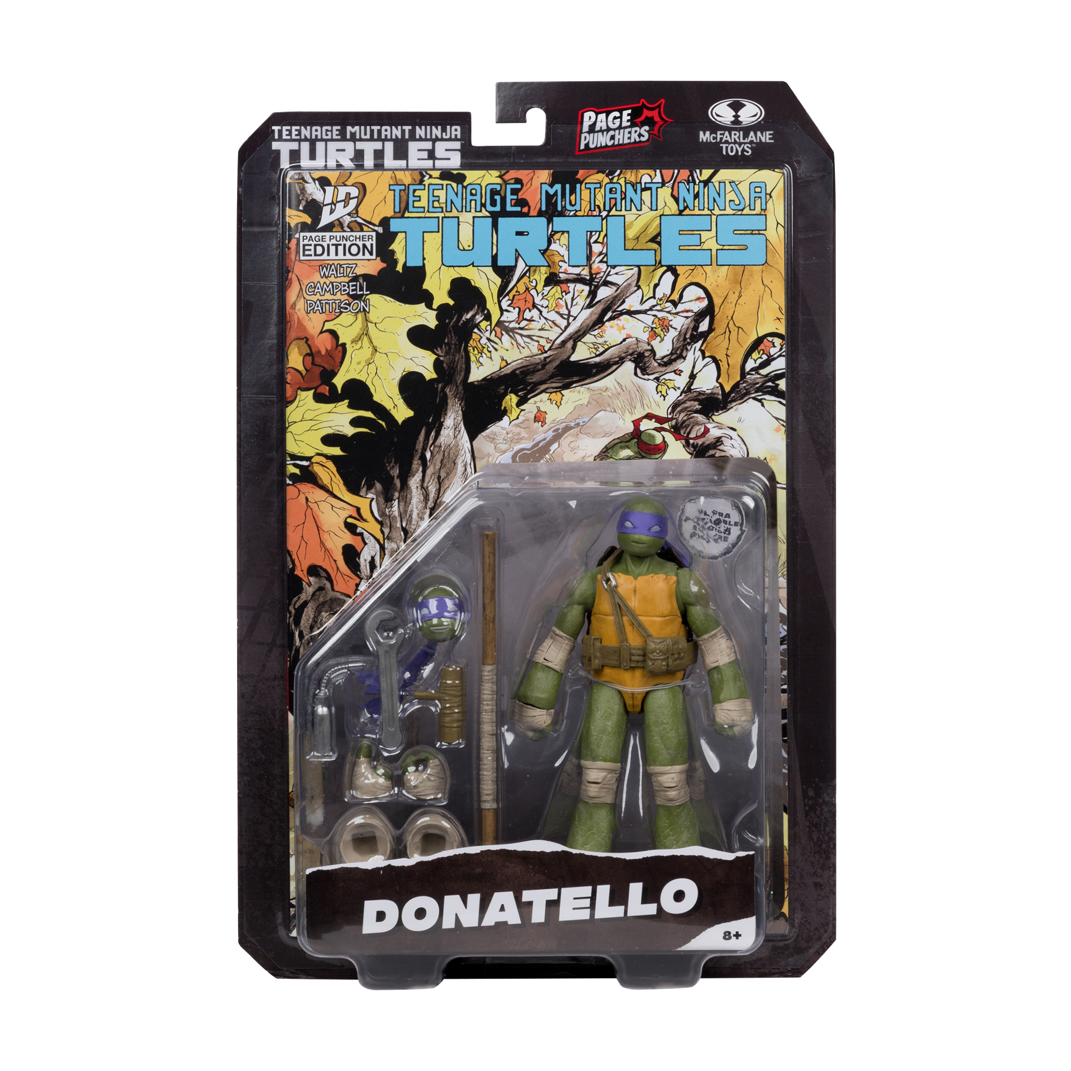Donatello-Actionfigur in Verpackung. Die Figur ist grün mit lila Maske und braunem Stab.