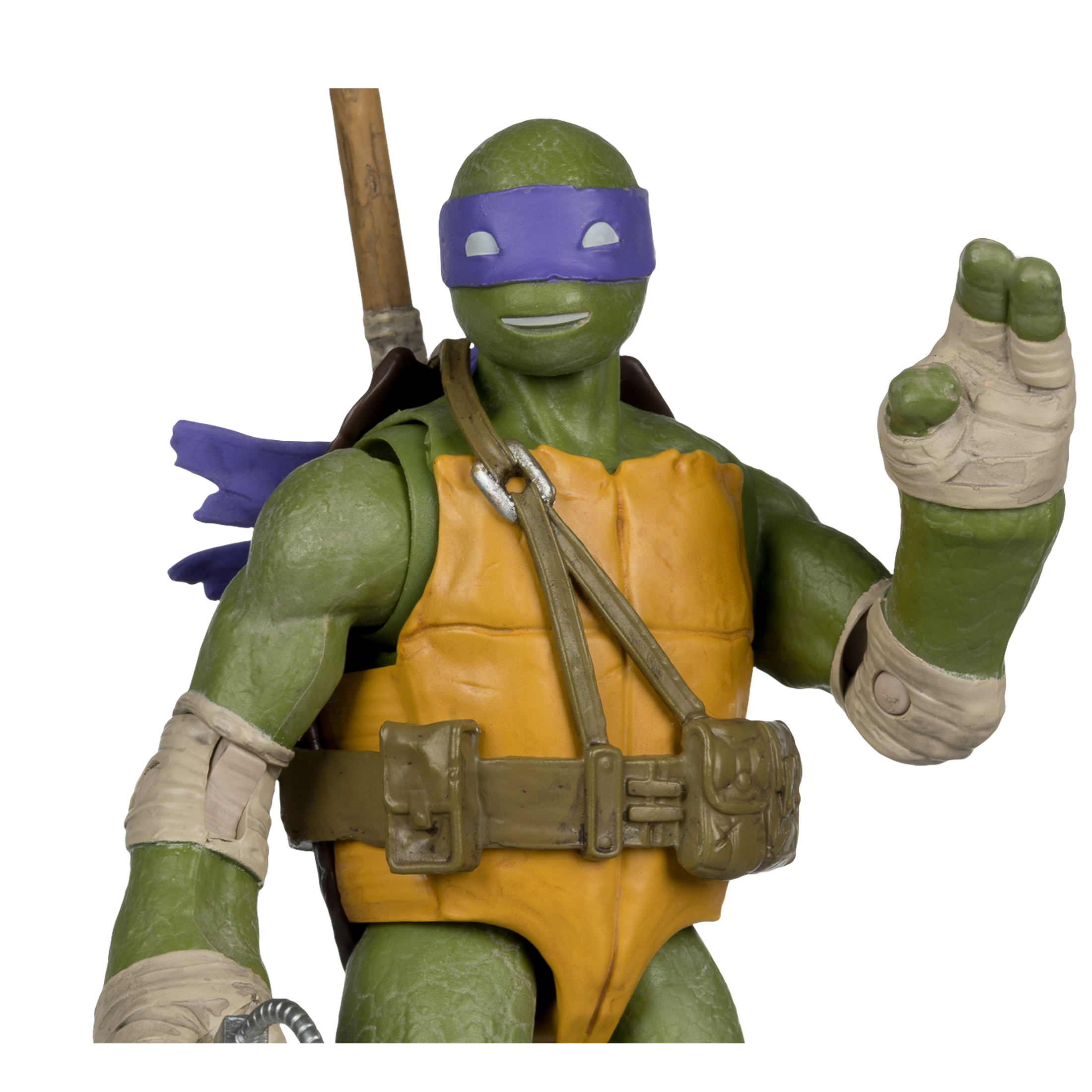 Eine Teenage Mutant Ninja Turtle-Figur. Sie ist grün mit einer lila Maske, gelbem Torso und einem braunen Stab dahinter.