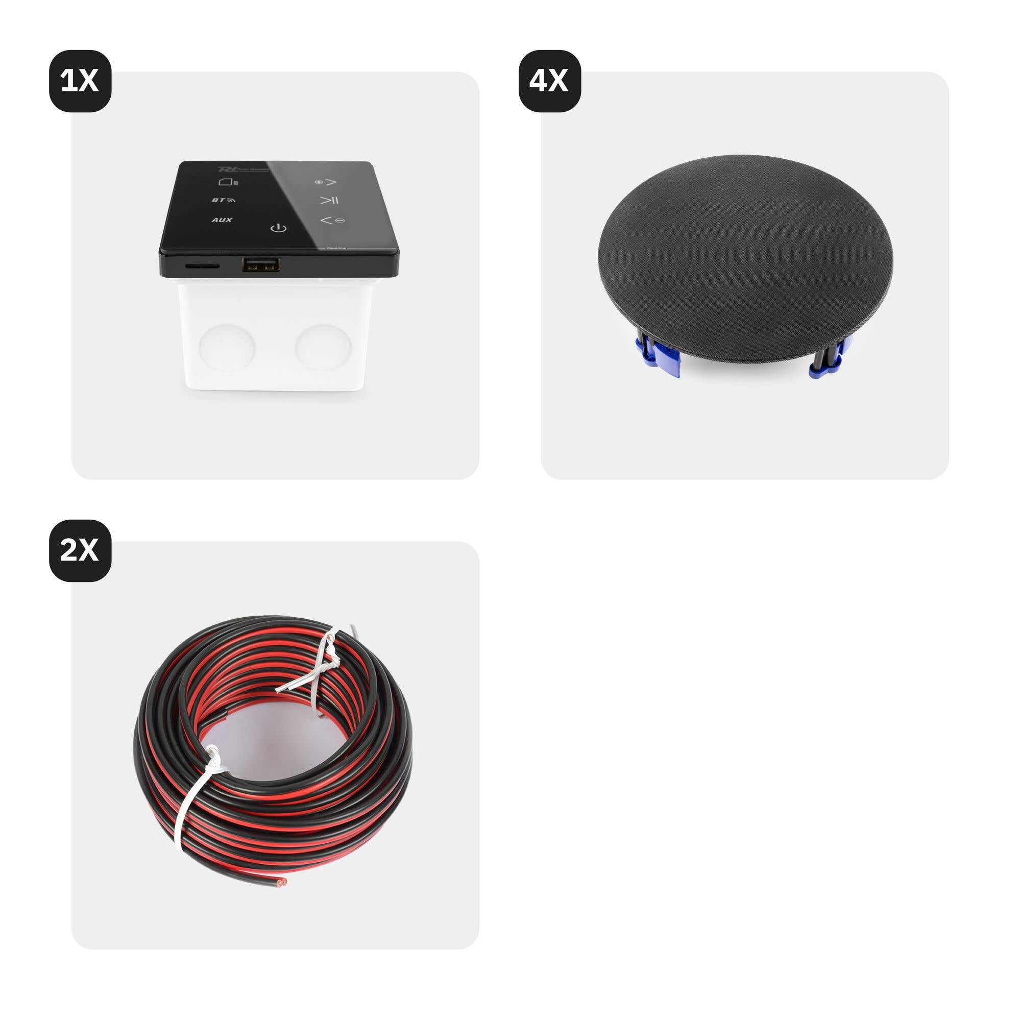 La imagen muestra un altavoz negro, un objeto negro redondo y un rollo de cable rojo/negro. El fondo es blanco.