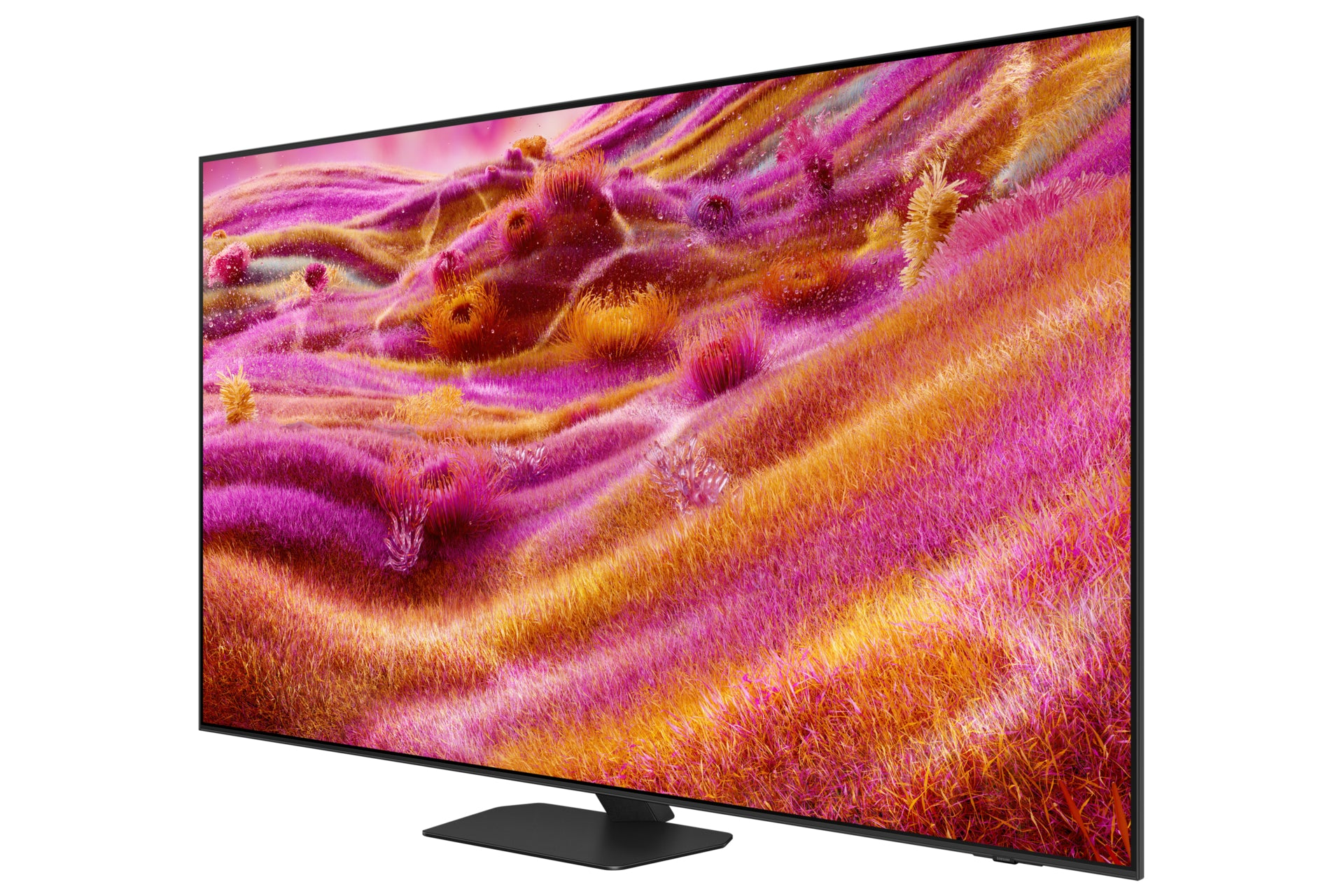 Una moderna TV mostra un paesaggio astratto colorato di tonalità rosa, arancioni e gialle. Ha una cornice e un supporto neri.
