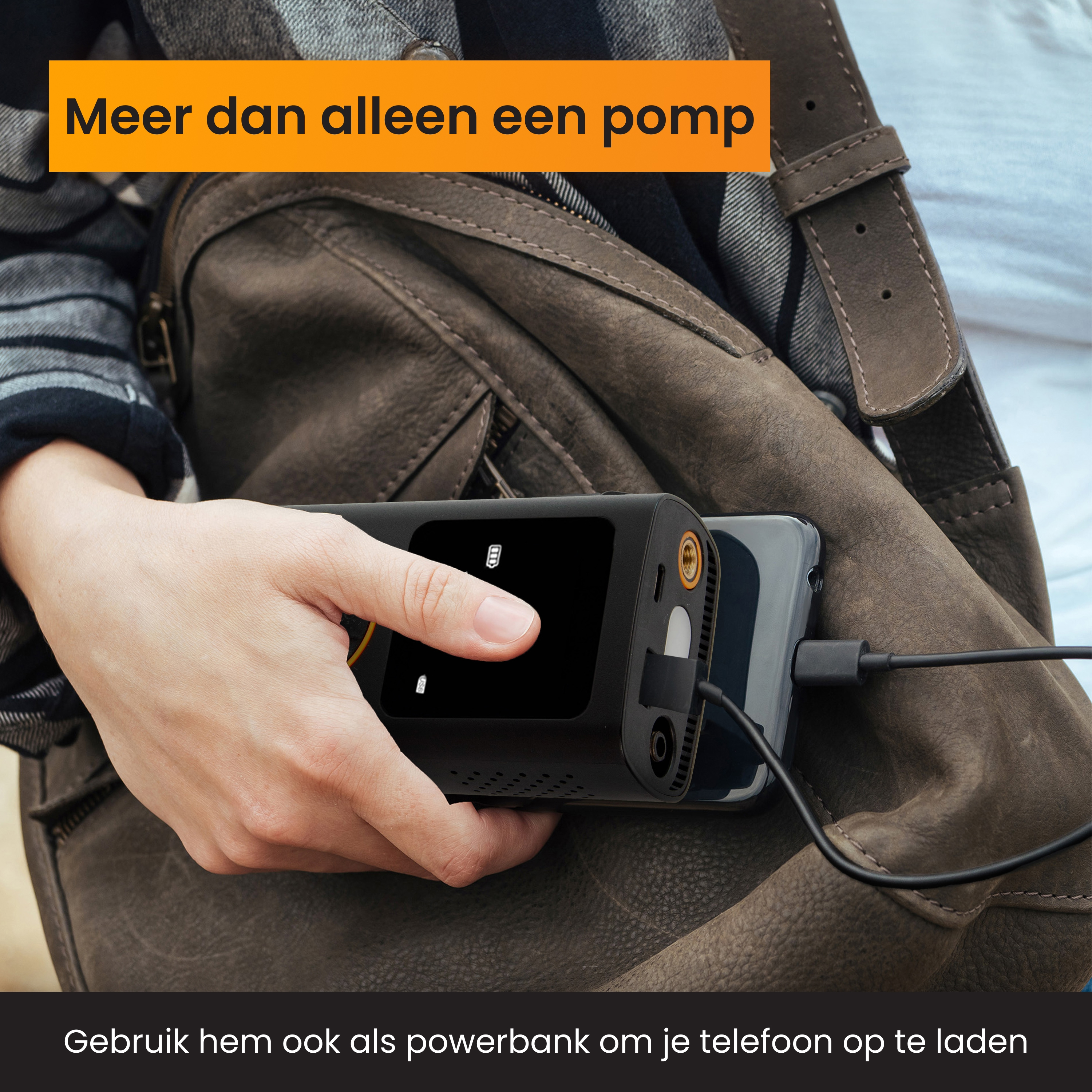 A hand holds a black device charging a phone. A bag is in the background. Text says 'More than just a pump.'