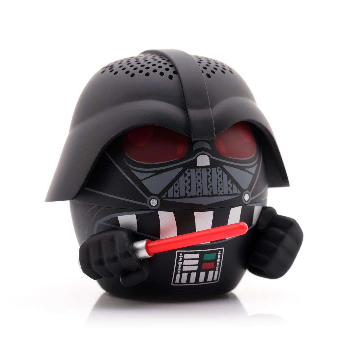 Eine Cartoon-Figur von Darth Vader. Es ist schwarz mit einem roten Lichtschwert. Besitzt Helm und Maske. Hält das Lichtschwert.