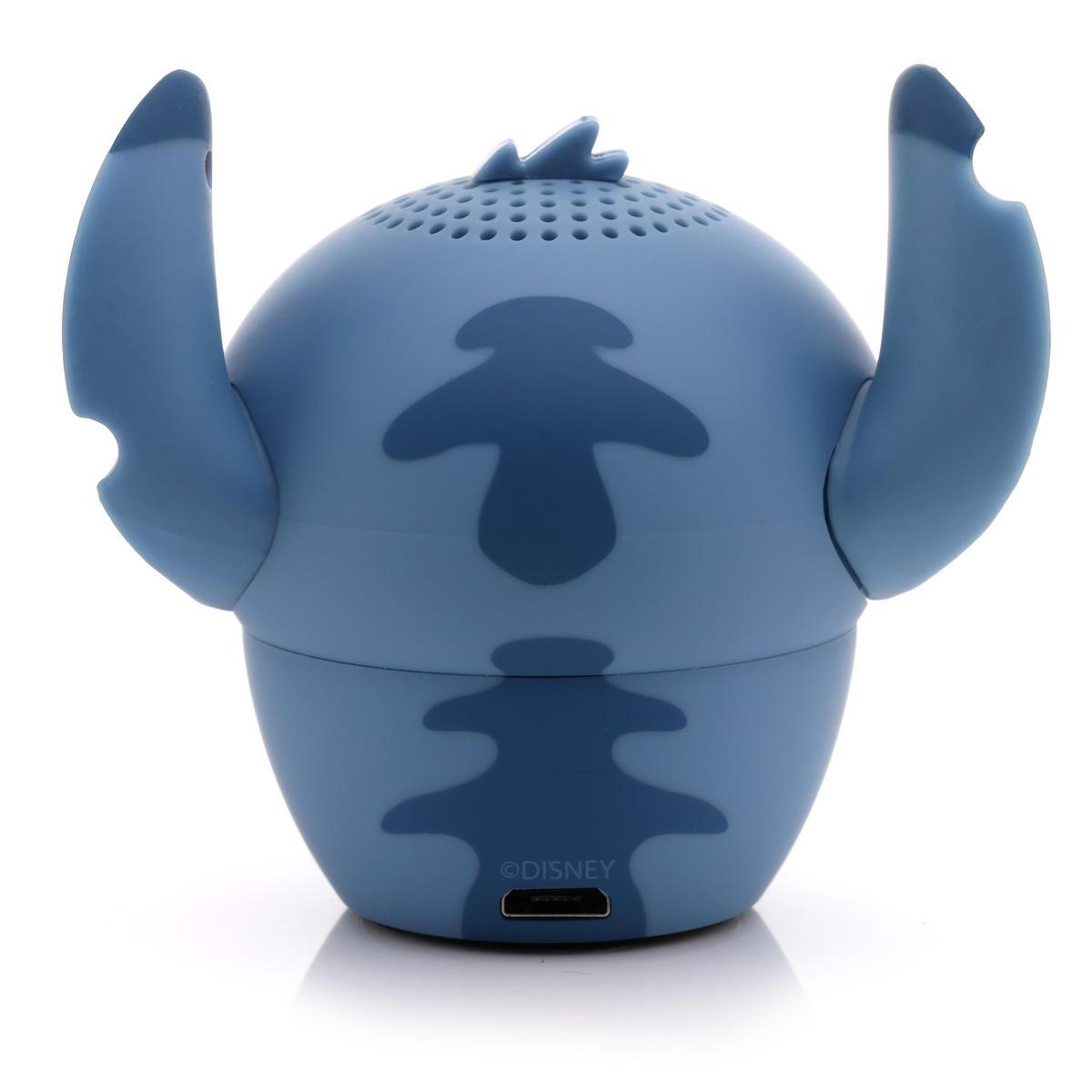 Un altoparlante blu a forma di Stitch. Ha due grandi orecchie, una parte superiore strutturata e un logo Disney.