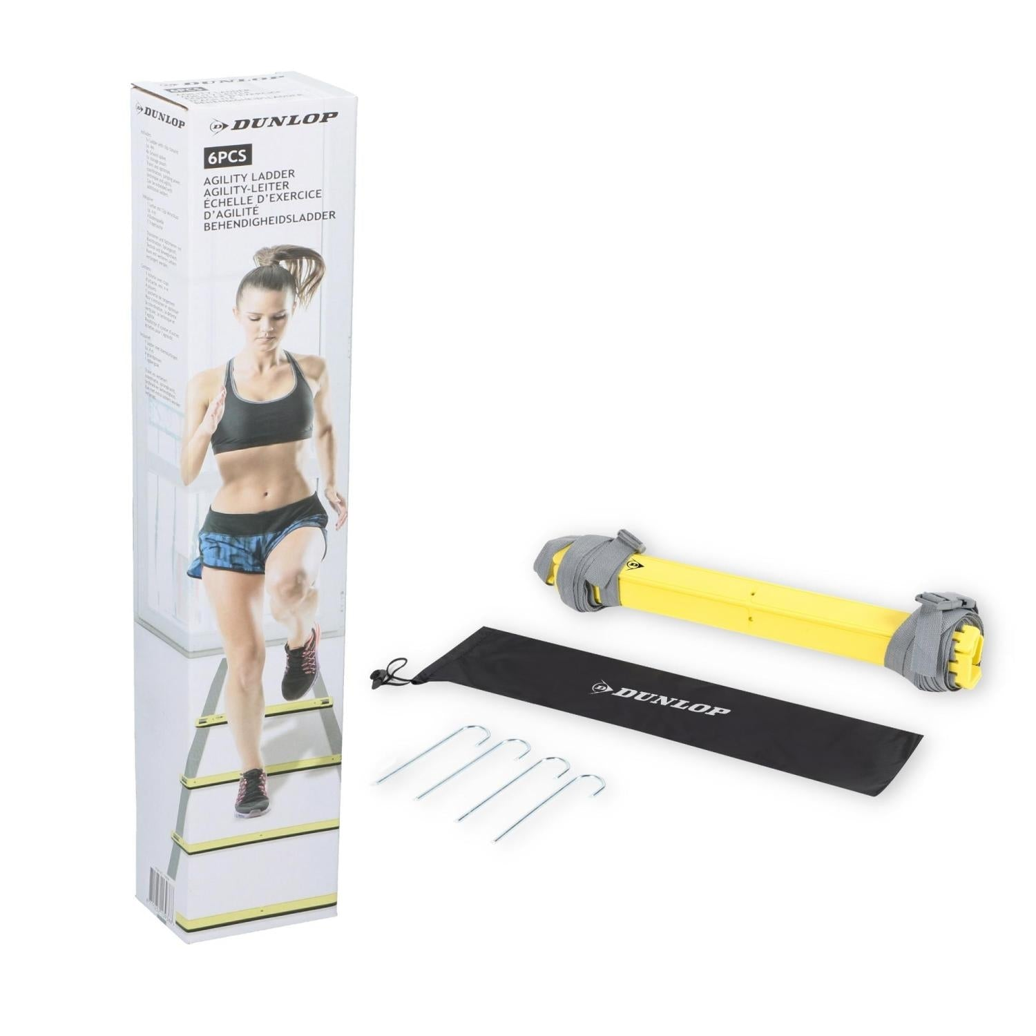 A woman running on an agility ladder is on the box. Beside it, a yellow ladder, a black bag, and metal stakes.
