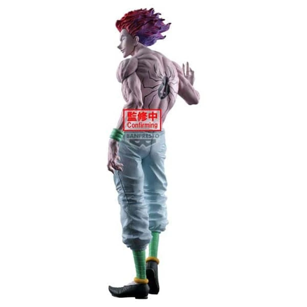 Una statuetta di un personaggio con capelli rossi, corporatura muscolosa, pantaloni azzurri, dettagli verdi e scarpe nere. È una posa.