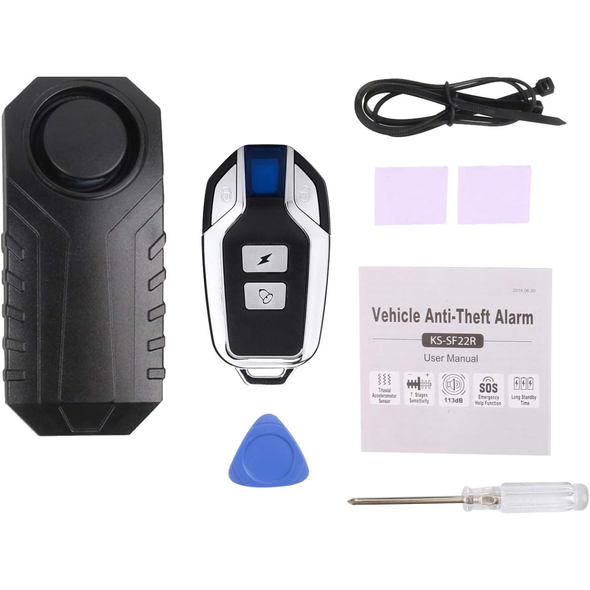 Ein Diebstahlwarnanlagen-Kit mit Sirene, Fernbedienung, Benutzerhandbuch und Werkzeugen. Enthält Kabelbinder, Klebepads und ein kleines blaues Kunststoffwerkzeug.