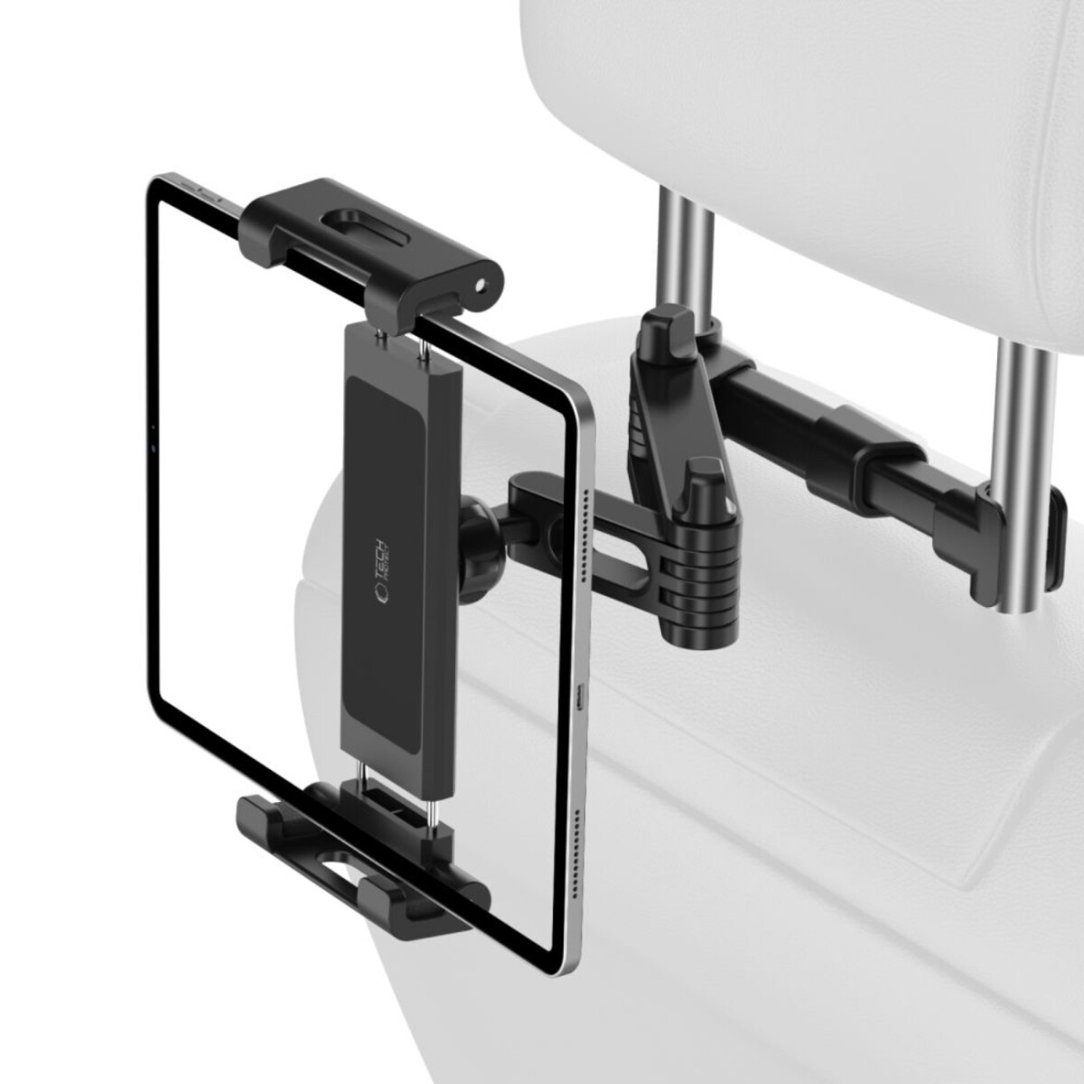 Schwarzer Tablethalter an einer Kopfstütze befestigt. Das Tablet ist eingesetzt, der Halter ist einsatzbereit.