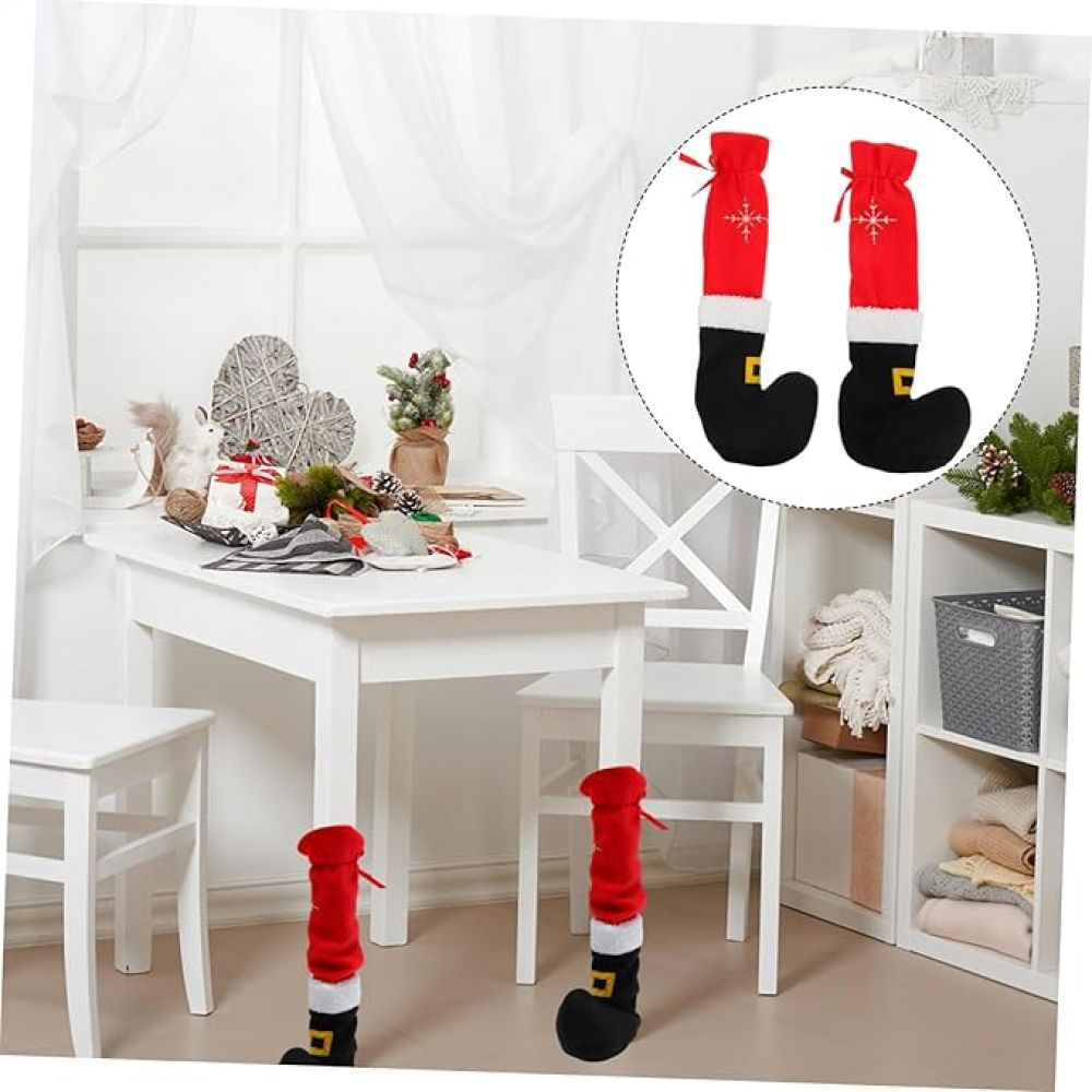 Ein Raum mit einem weißen Tisch, Stühlen und Santa-Beindekorationen. Der Einsatz zeigt zwei Santa-Beindekorationen.
