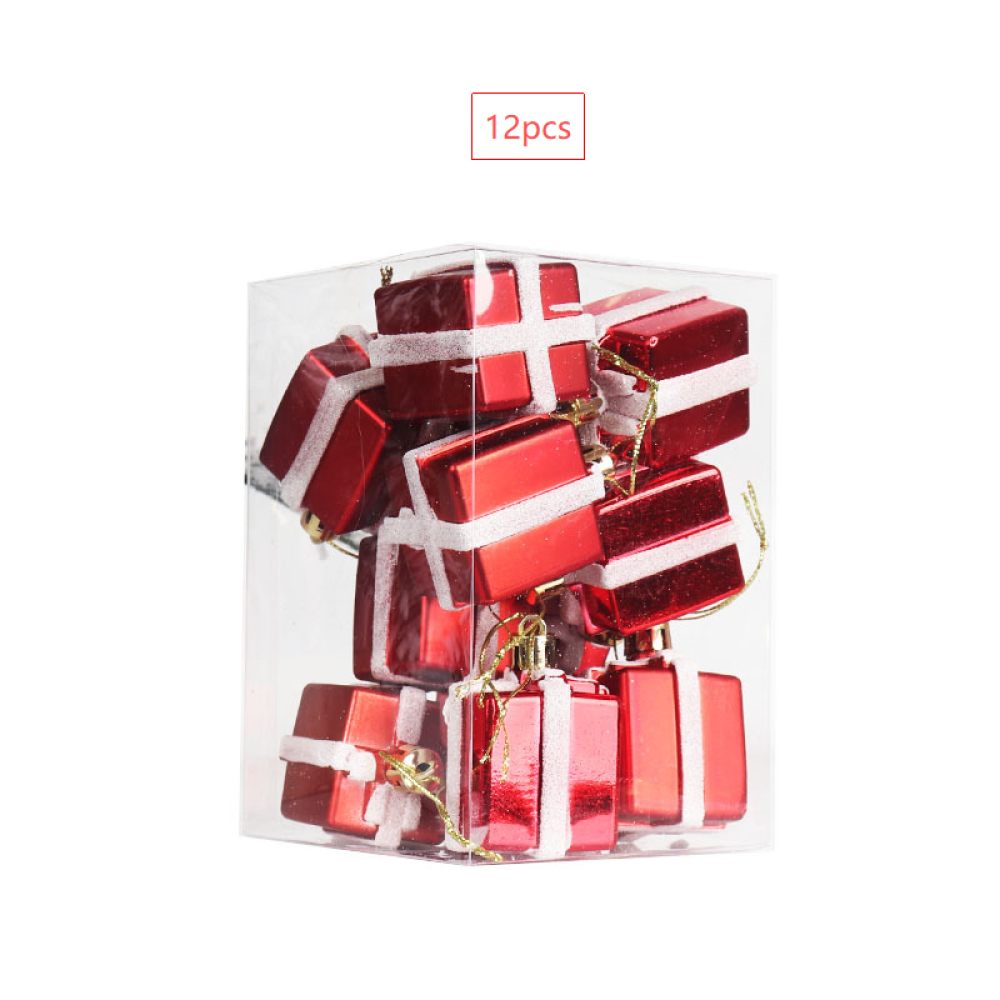 Eine transparente Box mit 12 roten Geschenkornamenten mit weißem Band und goldenen Schnüren. Oben rechts steht '12 Stück'.