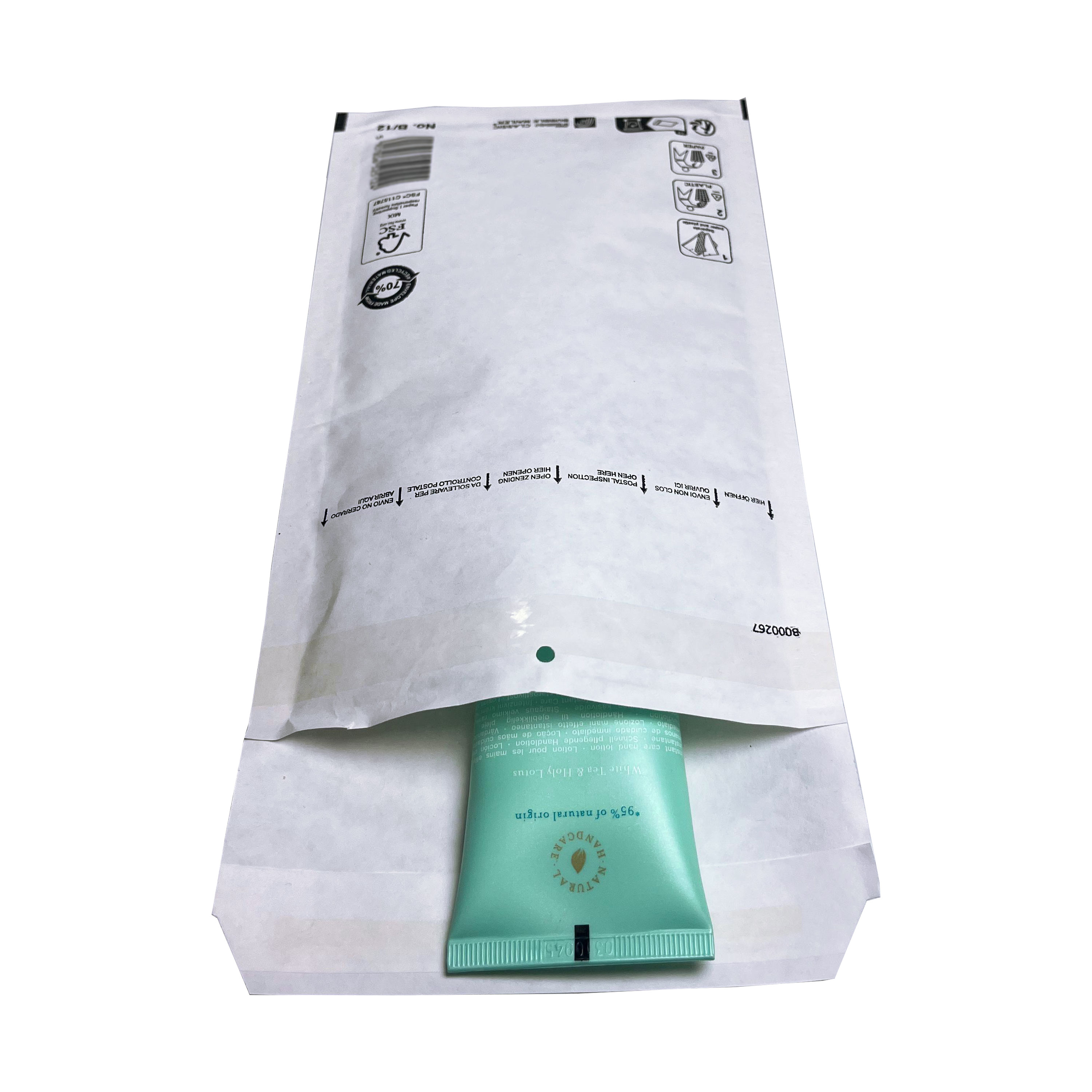 A white padded envelope with a green tube of lotion partially visible. Text and symbols are present.