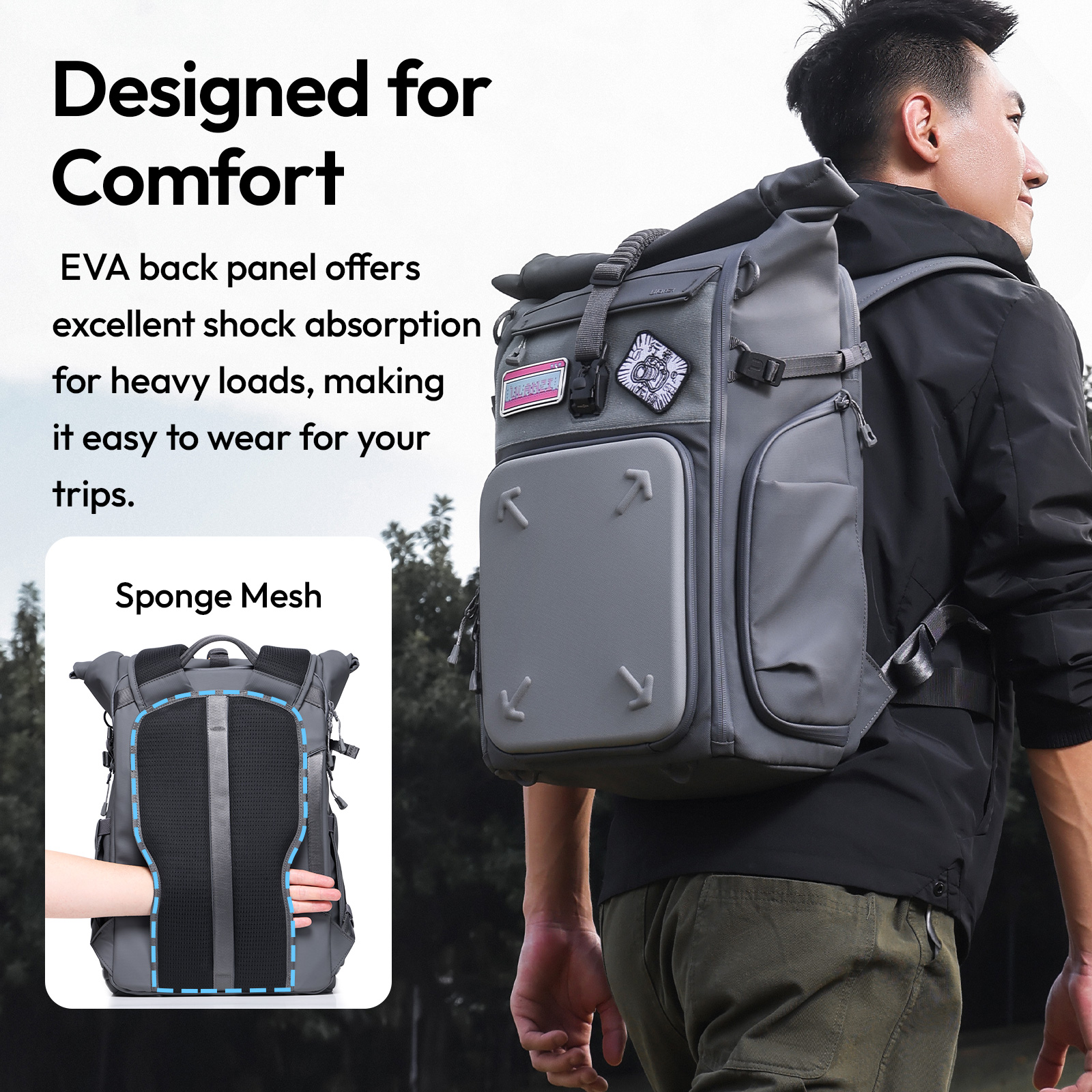 Ein Mann trägt einen grauen Rucksack. Der Rucksack ist für Komfort konzipiert, mit EVA-Rückwand und Schwammsaum.