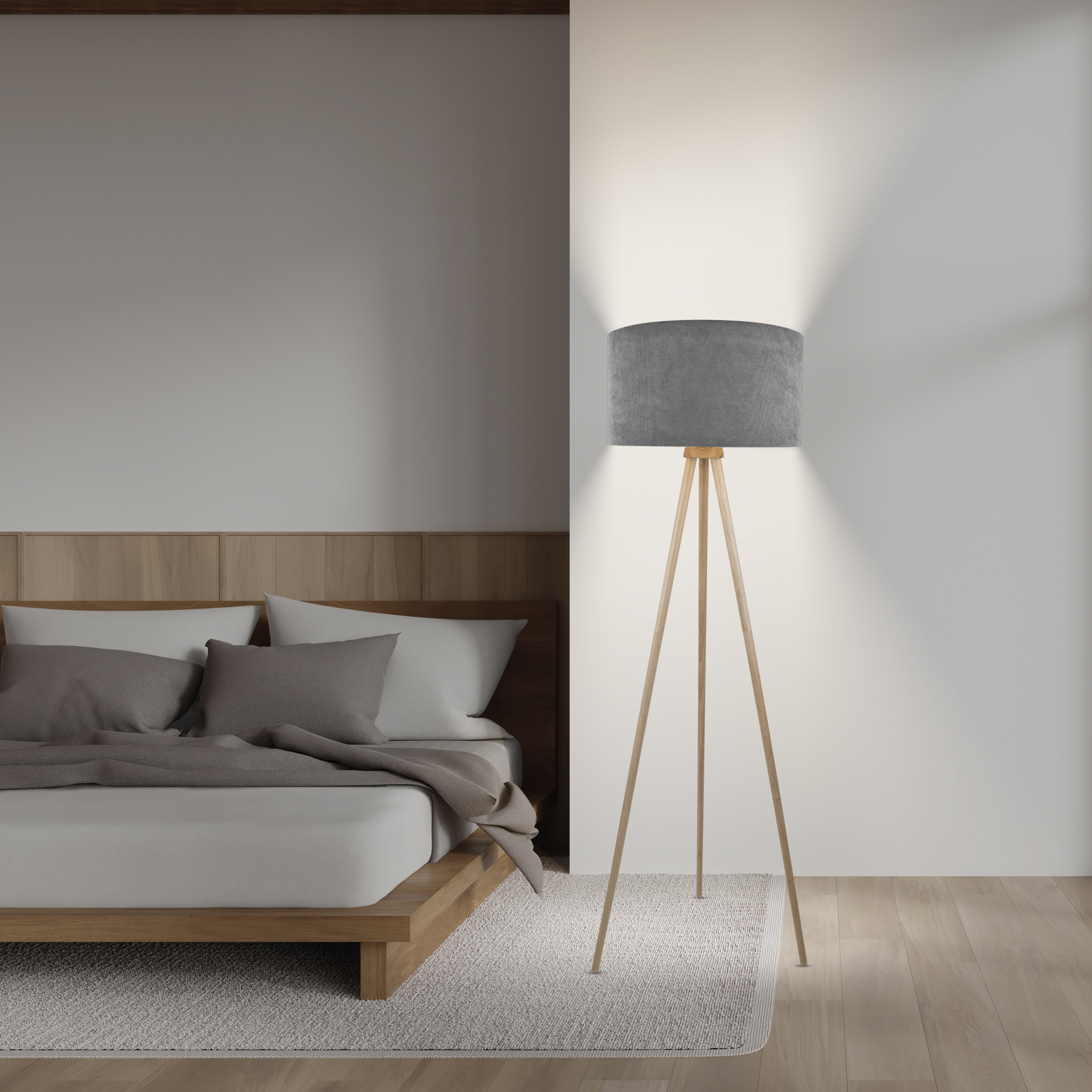 Schlafzimmerszene mit Bett, Kissen, Decke und Stehlampe. Licht scheint auf die Wand.