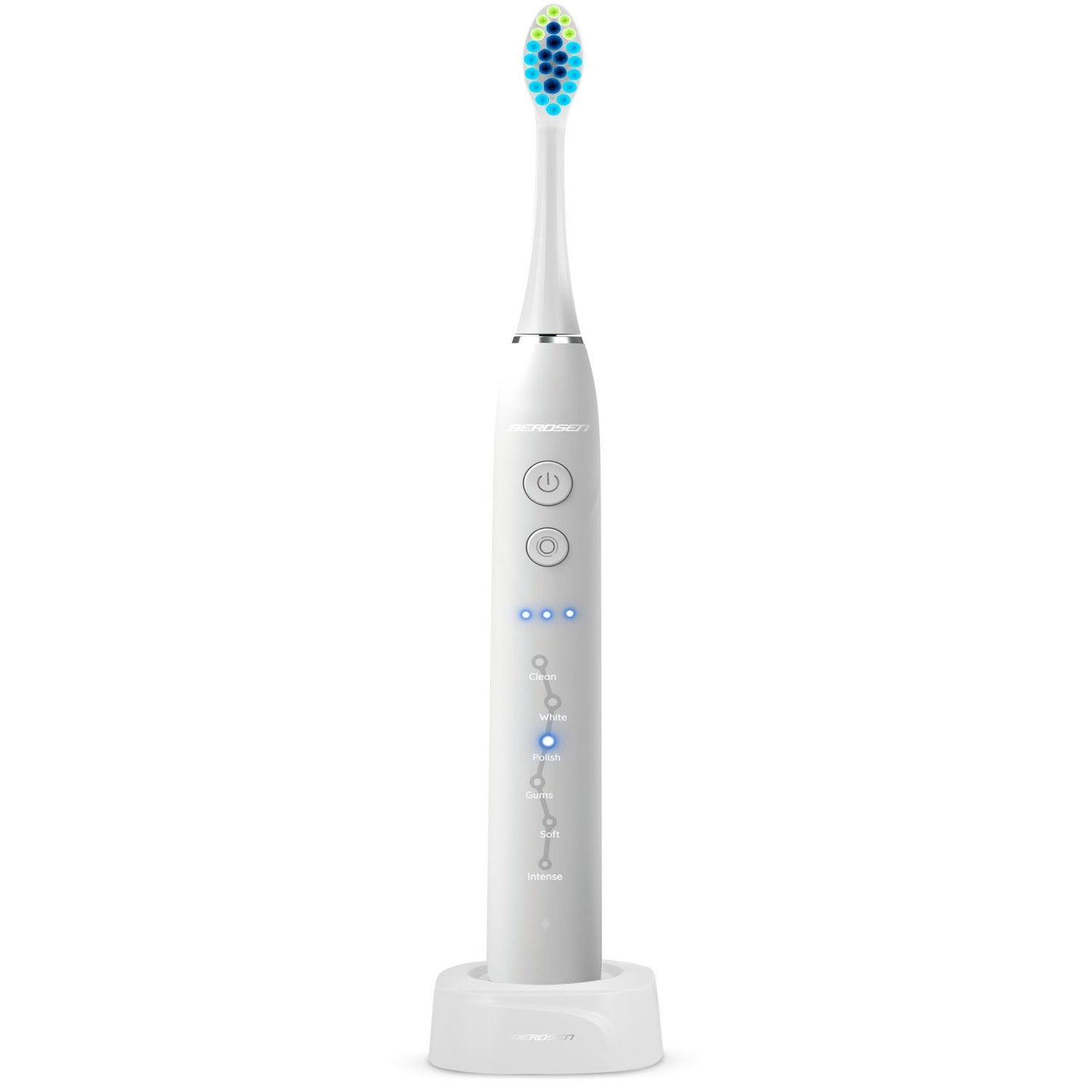 Un cepillo de dientes eléctrico blanco con cerdas azules y verdes, un botón de encendido y indicadores de modo de limpieza. Está en una base de carga.