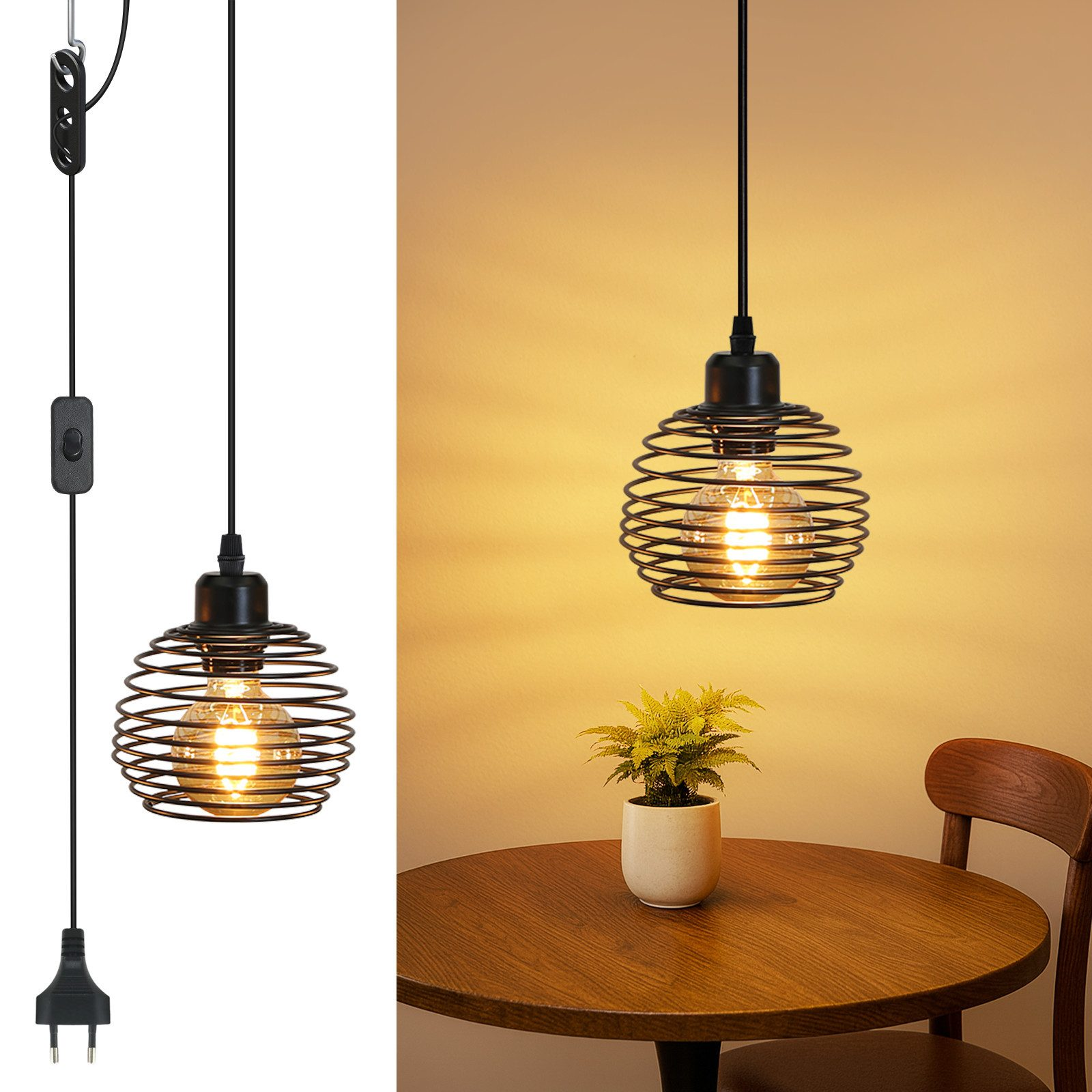 Una lampada a sospensione con paralume a spirale pende sopra un tavolo di legno, sono visibili una pianta e una sedia.