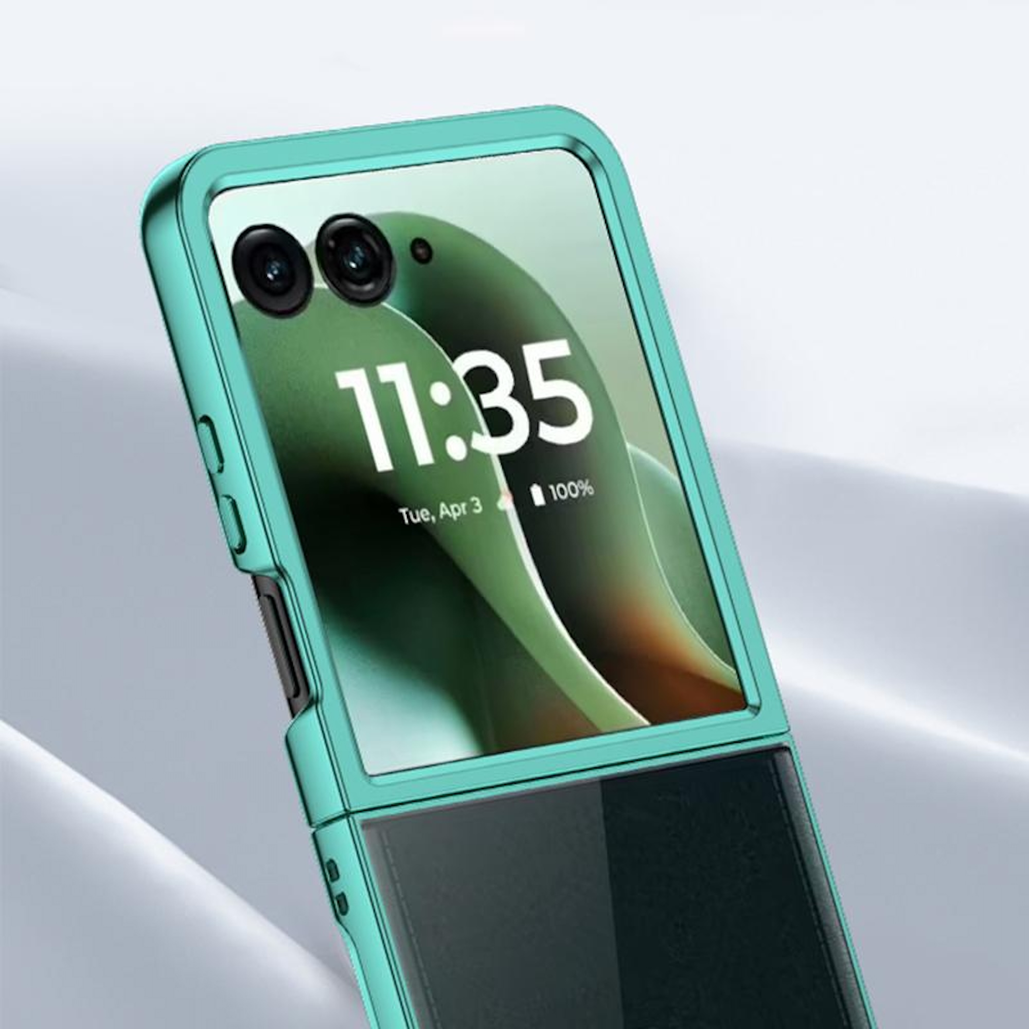 Ein türkisfarbenes Telefon mit einem Bildschirm, der 11:35 und Dienstag, 3. April anzeigt. Es ist ein Klapphandy.