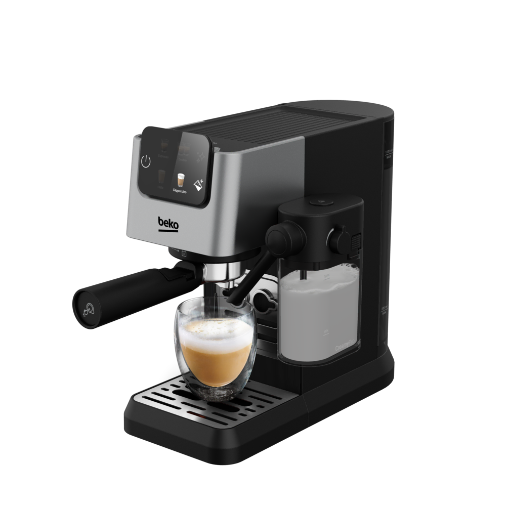 Bir Beko espresso makinesi ve bir bardak kapuçino. Makine siyah ve gümüş renktedir. Süt köpürtücü sağda.