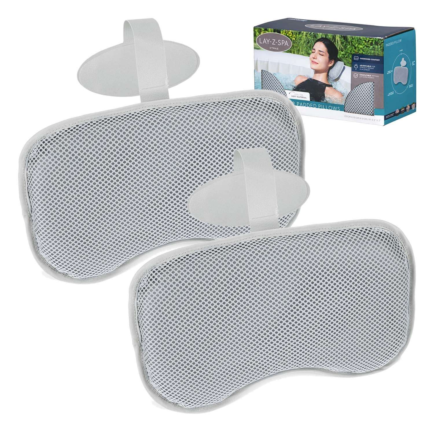 Se muestran dos almohadas de spa de malla gris con accesorios blancos. También hay una caja con una mujer relajándose en un spa.