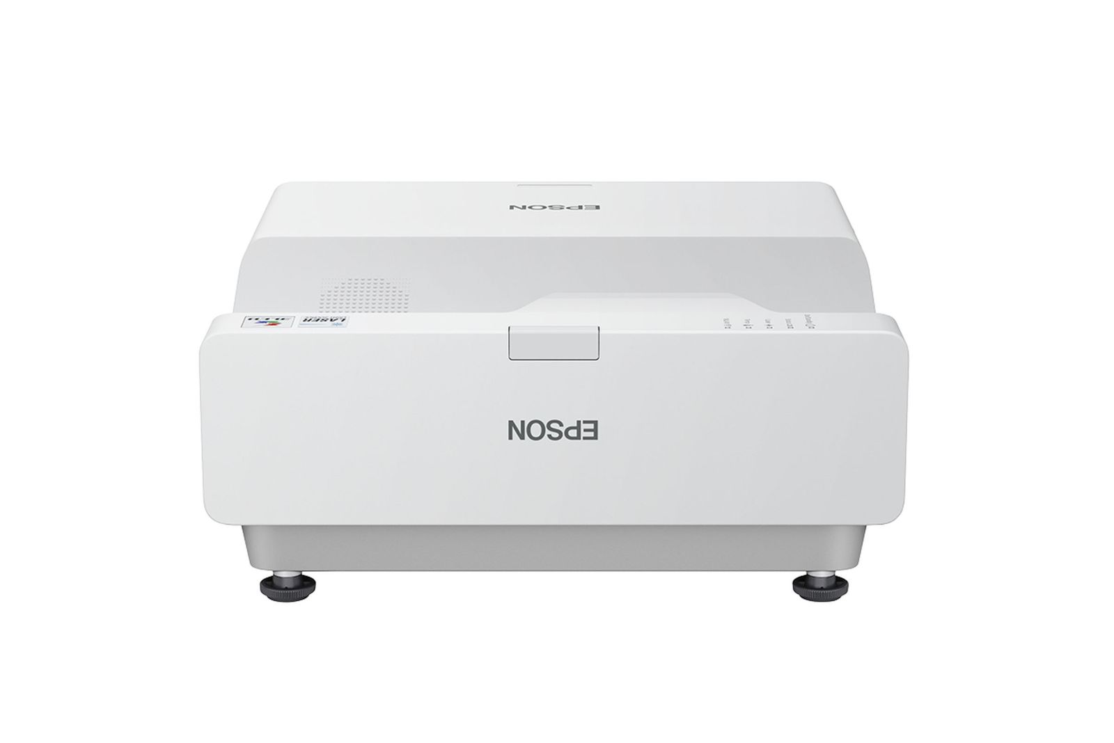 Un projecteur Epson blanc avec le nom de la marque à l'avant. Il a un design rectangulaire et repose sur de petits pieds.