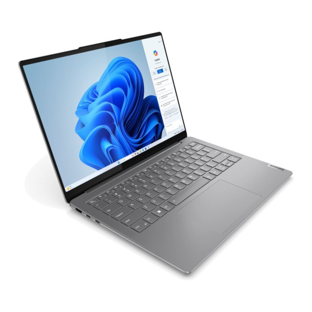 Szary laptop Lenovo jest otwarty, wyświetlając niebieski abstrakcyjny obraz na ekranie. Klawiatura jest widoczna, a tło jest białe.