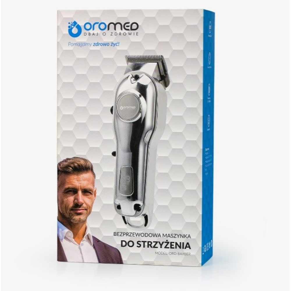 Scatola con tagliacapelli argentato. Volto di uomo sulla scatola. Testo in polacco: 'Tagliacapelli senza fili per tagliare' e il marchio 'Oromed'.