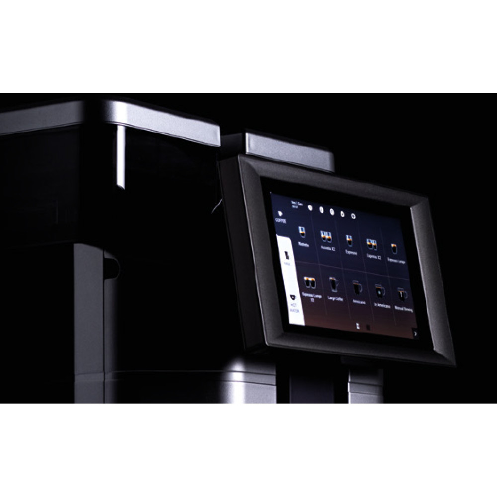 Zbliżenie ekspresu do kawy z ekranem dotykowym. Ekran wyświetla różne opcje kawy. Ekspres jest czarny i srebrny.