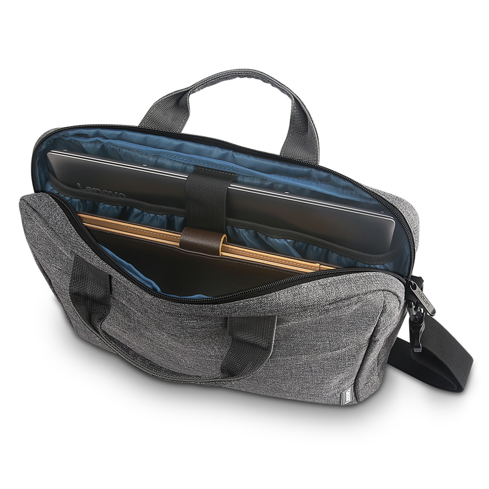 Graue Laptoptasche, geöffnet, mit Laptop und Dokumenten. Die Tasche hat Griffe und einen Schultergurt.