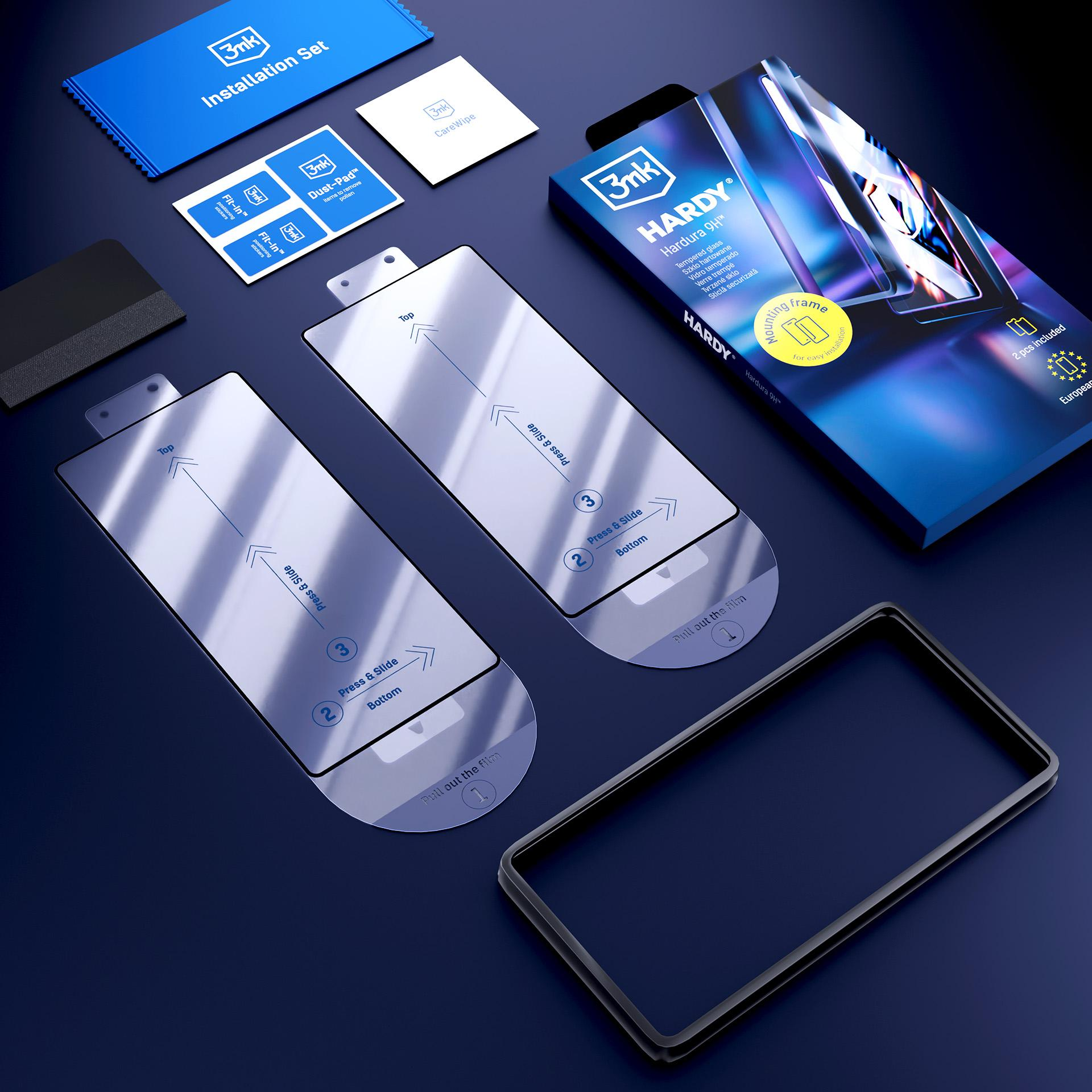 Zestaw ochraniacza ekranu telefonu. Zawiera ochraniacze, chusteczki i narzędzia na niebieskiej powierzchni.
