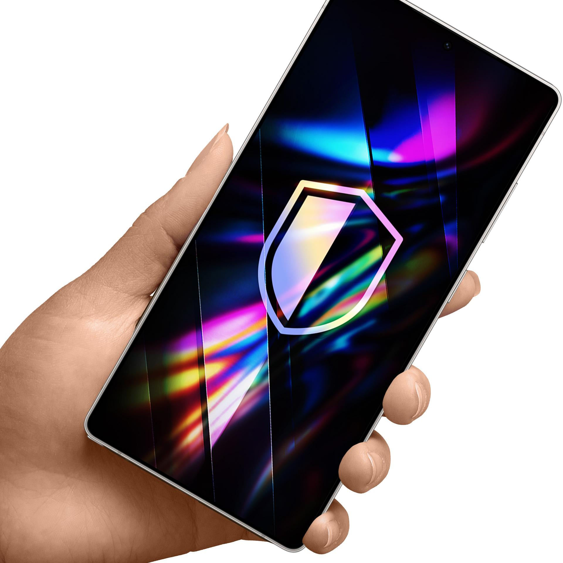 Dłoń trzymająca smartfon. Ekran wyświetla kolorową ikonę tarczy z abstrakcyjnym tłem.