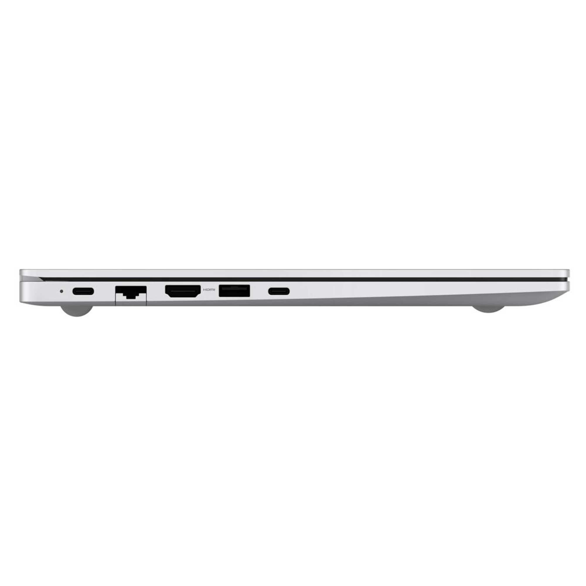 Gümüş renkli bir dizüstü bilgisayarın yan görünümü. Görünür bağlantı noktaları USB-C, Ethernet, HDMI ve USB'dir. İnce ve hafiftir.