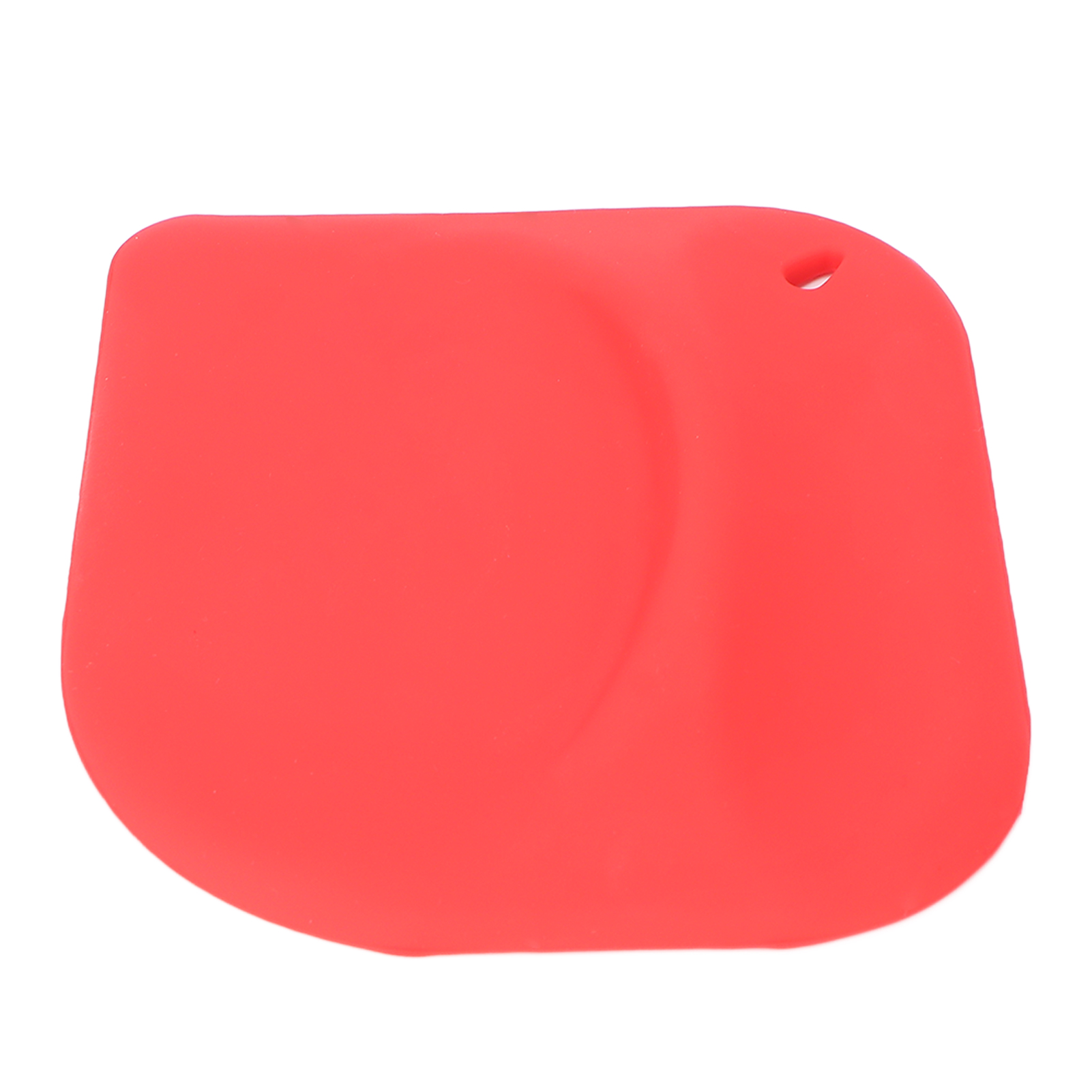 Ein roter Silikonspatel auf weißem Hintergrund. Er hat eine abgerundete Form mit einem Loch oben.