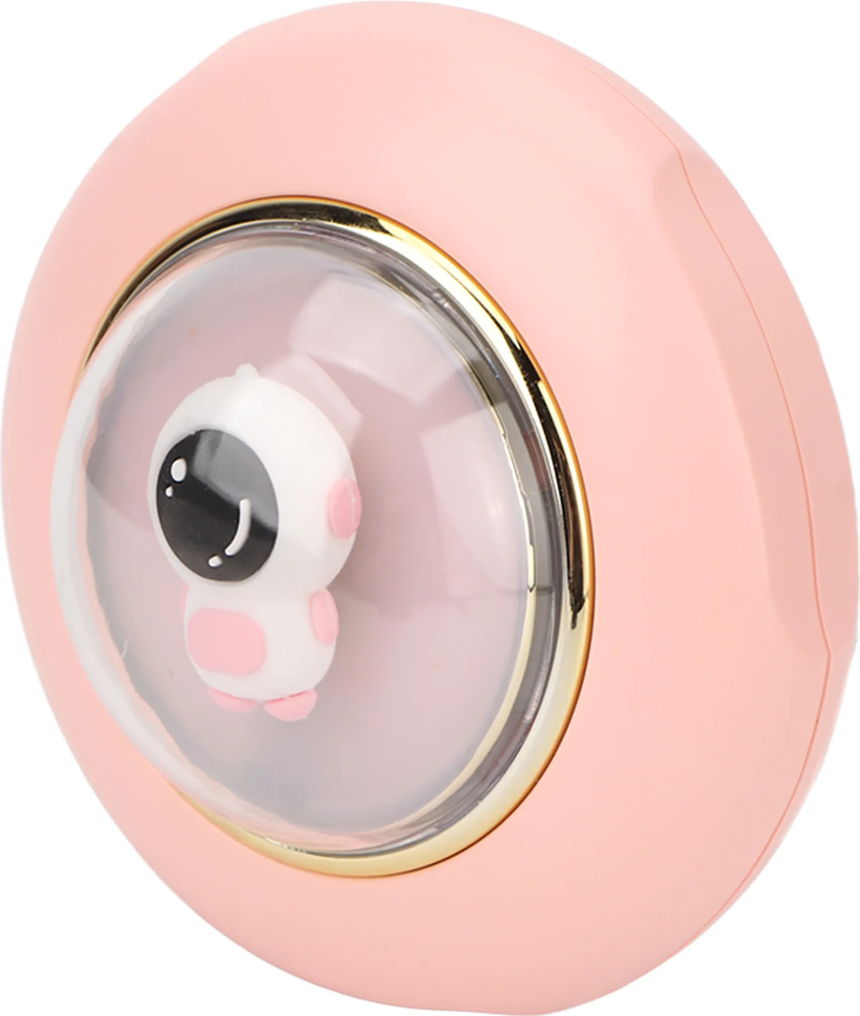 Ein rosa, rundes Nachtlicht mit einer kleinen Astronautenfigur in einer durchsichtigen Kuppel.