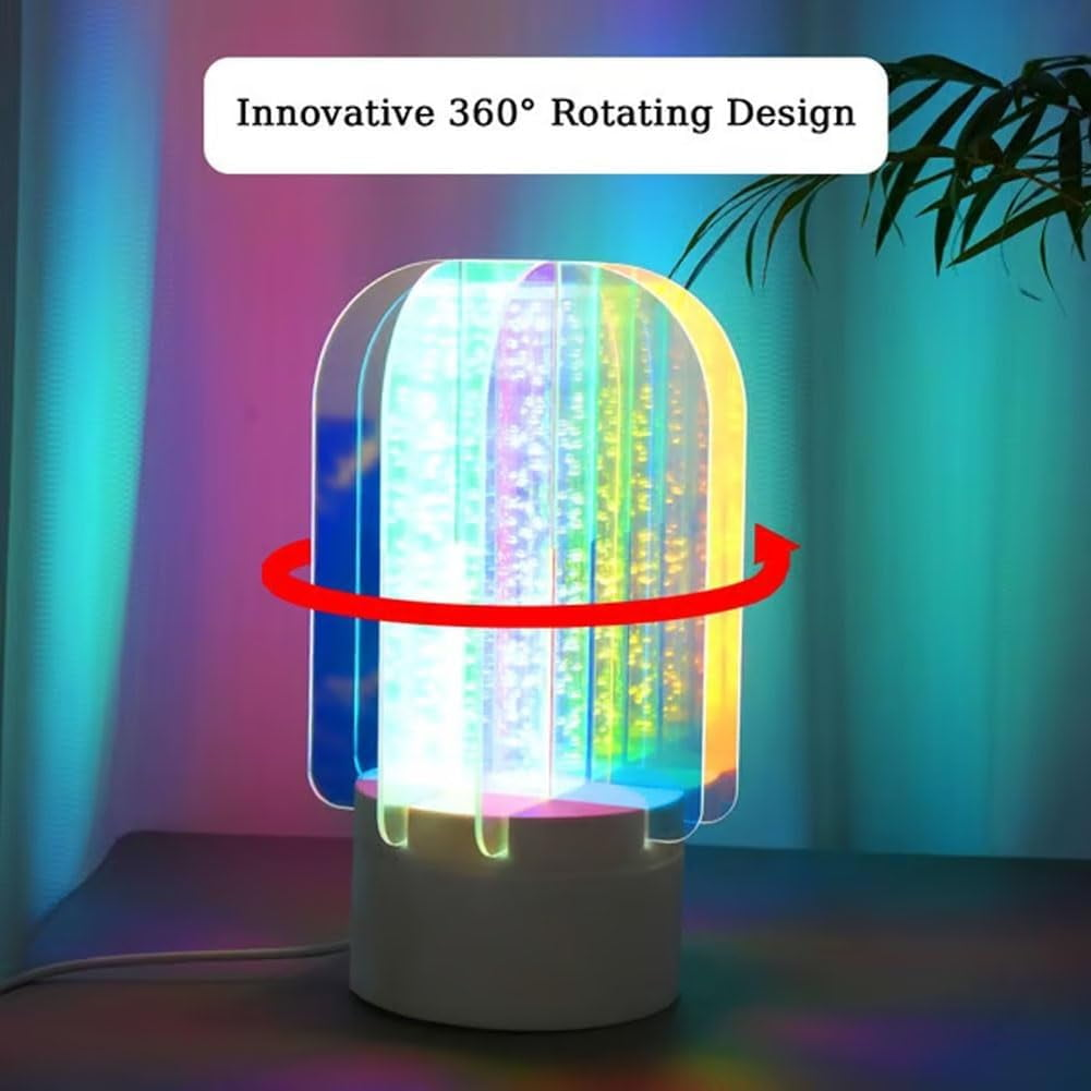 Eine farbenfrohe LED-Lampe mit rotierendem Design. Sie hat einen weißen Sockel und eine transparente, gewölbte Oberseite mit Regenbogenlichtern.