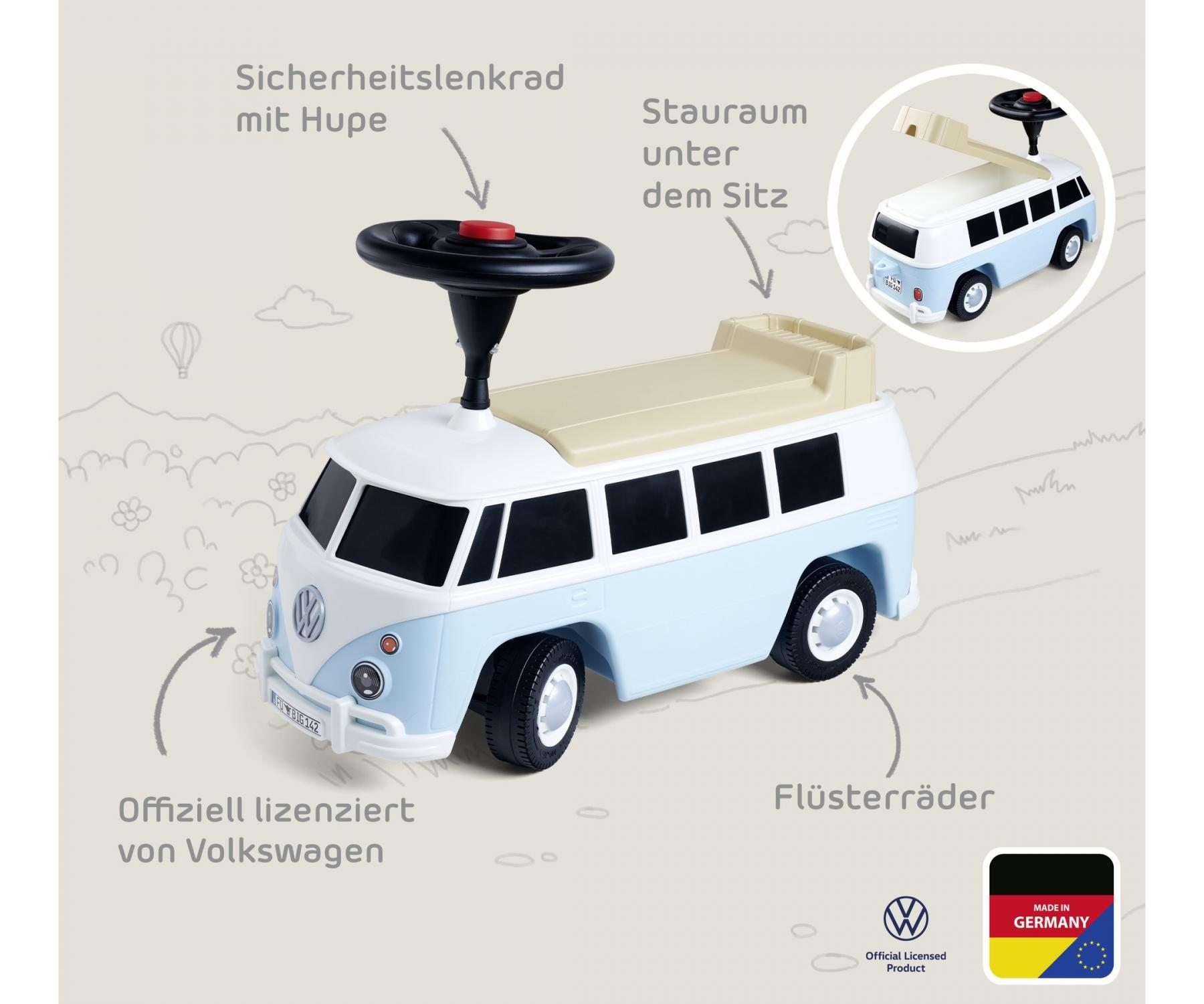 Ein blau-weißer VW-Spielzeugbus mit schwarzem Lenkrad, roter Hupe und Flüsterreifen. Es ist offiziell lizenziert.