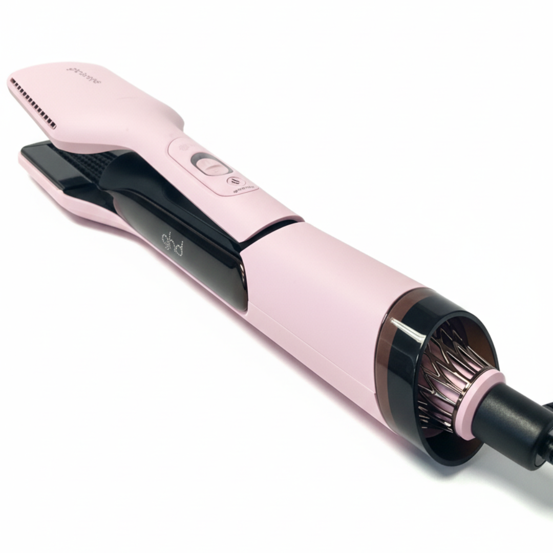 Ein pink-schwarzer GHD-Haarstyler auf weißem Hintergrund. Er hat ein Glätteisenende und ein Rundbürstenende.