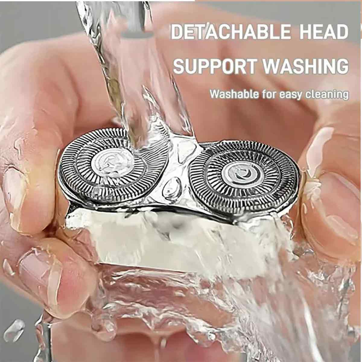 Nahaufnahme eines Scherkopfes, der mit Wasser gewaschen wird. Der Rasierer wird von einer Hand gehalten. Text: Abnehmbarer Kopf, unterstützt die Reinigung.