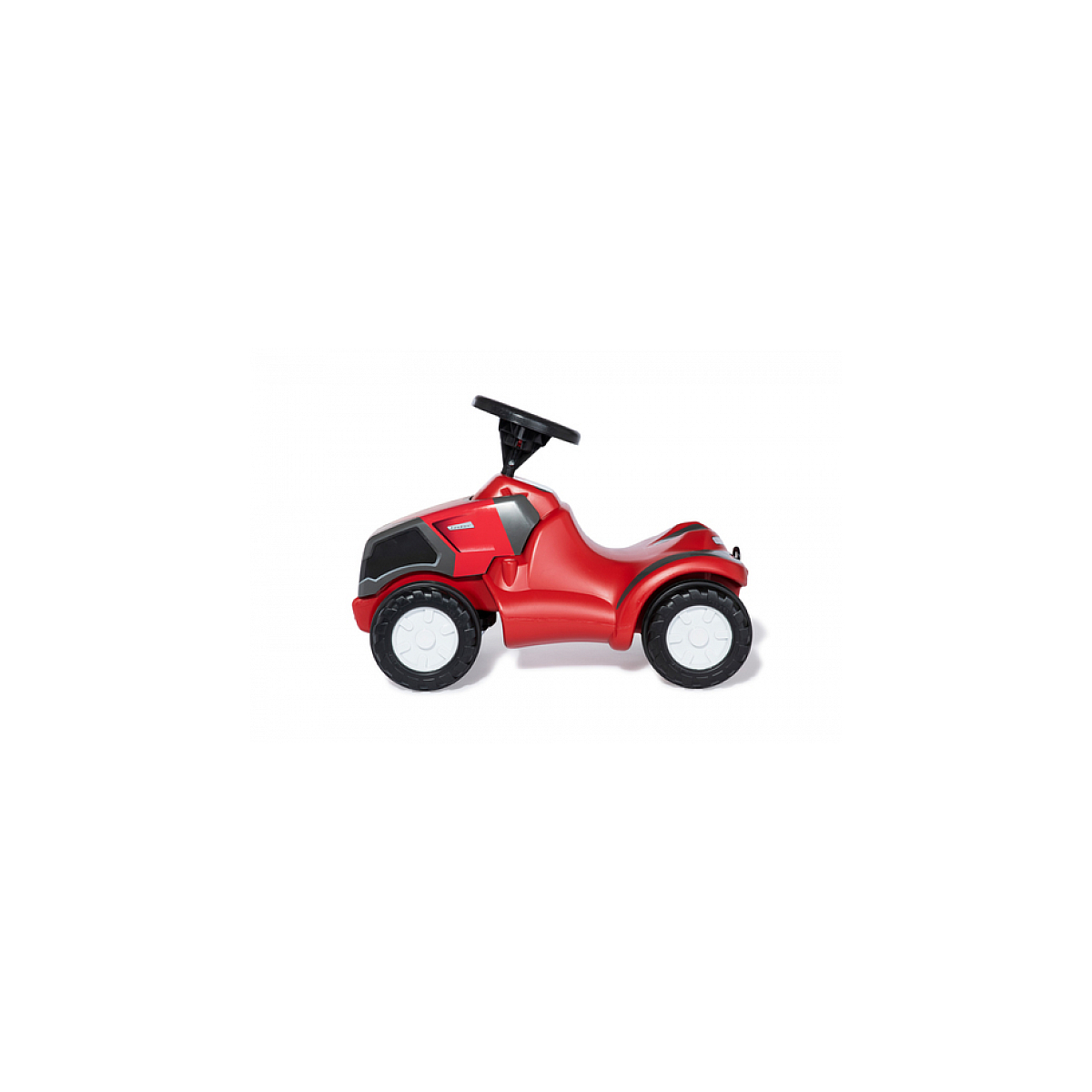 Un tractor de juguete rojo con volante y neumáticos negros, sobre un fondo blanco.