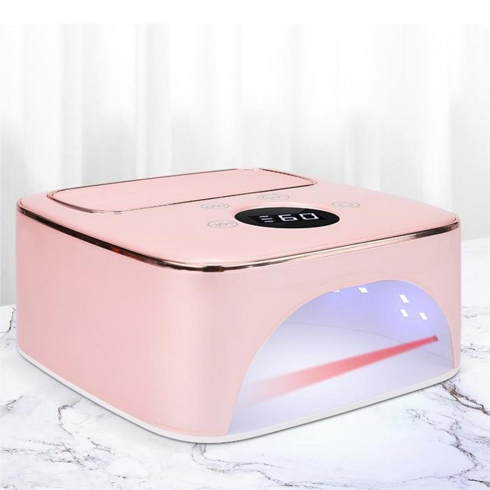 Eine rosa Nagellampe mit Digitalanzeige. Sie hat eine gebogene Öffnung mit Lichtern. Sie steht auf Marmor.