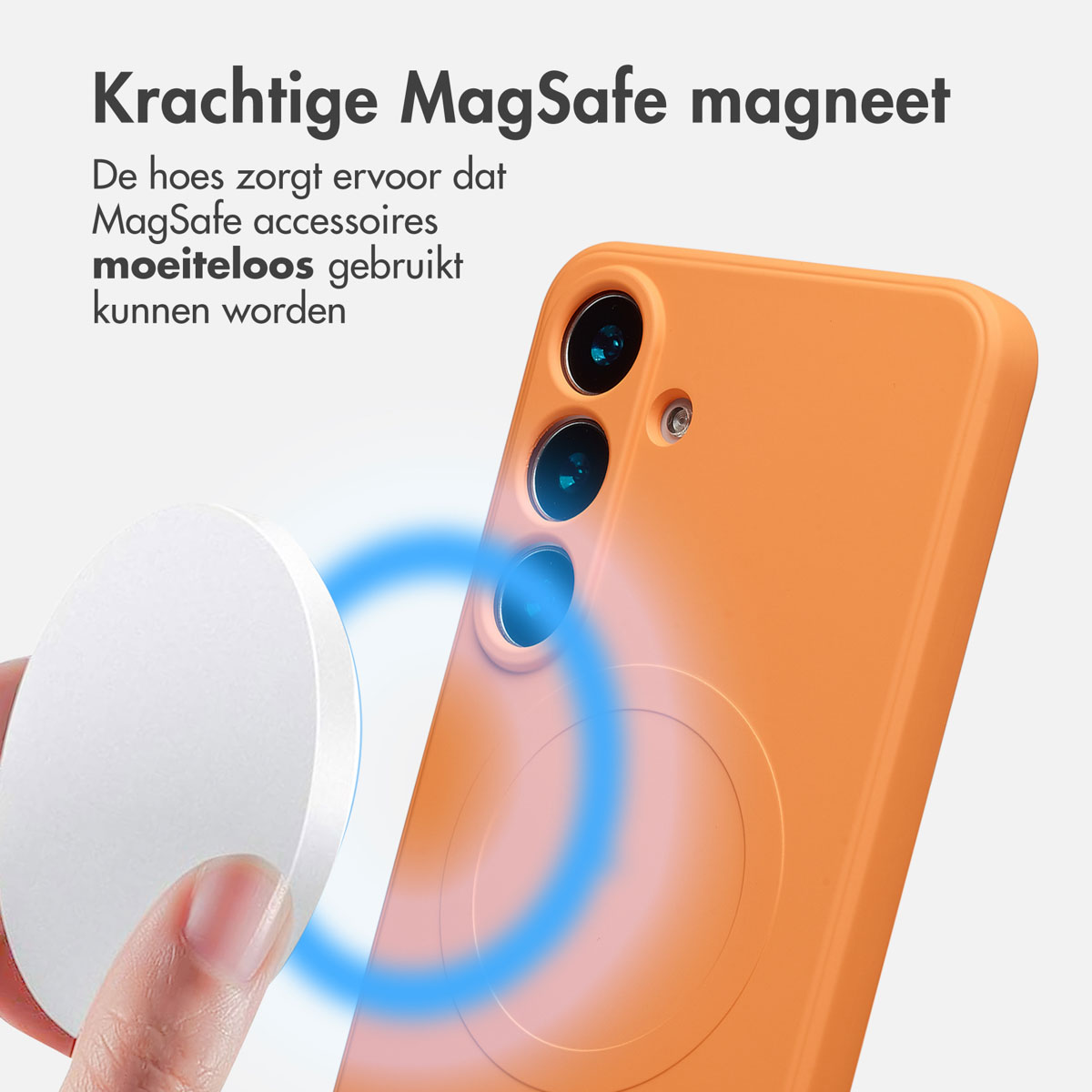 Een oranje telefoonhoesje met een witte magnetische schijf. De schijf bevindt zich in de buurt van de hoes, met een blauw magnetisch veld ertussen.