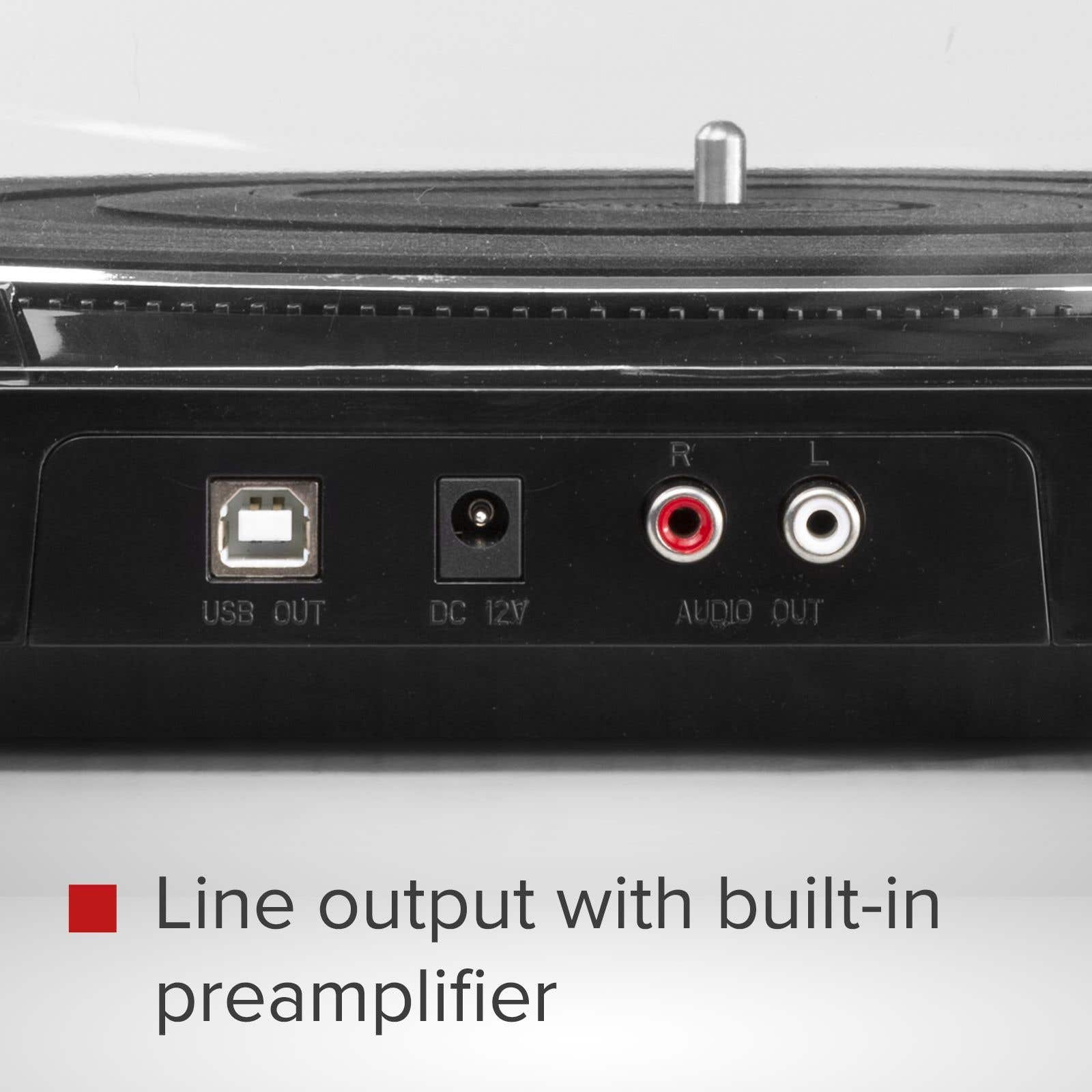 Close-up of a black device's back panel. USB, DC 12V, and audio outputs are visible. Text reads: Line output with built-in preamplifier.