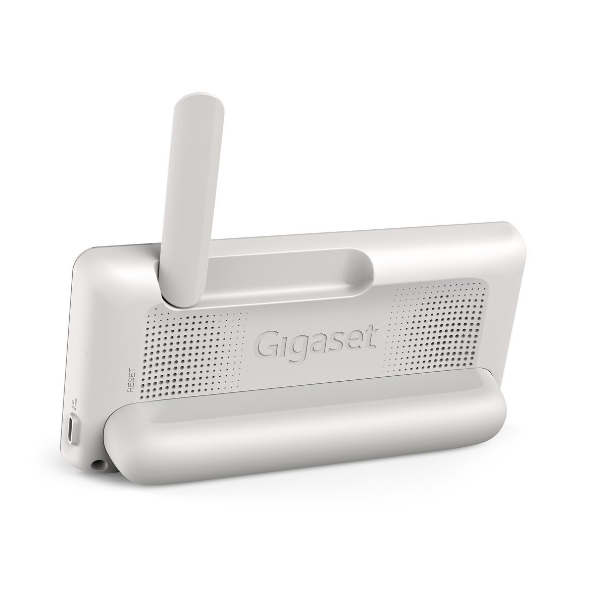 Una stazione base per telefono Gigaset bianca. Ha un supporto, un'antenna e il logo Gigaset. È su una superficie bianca.