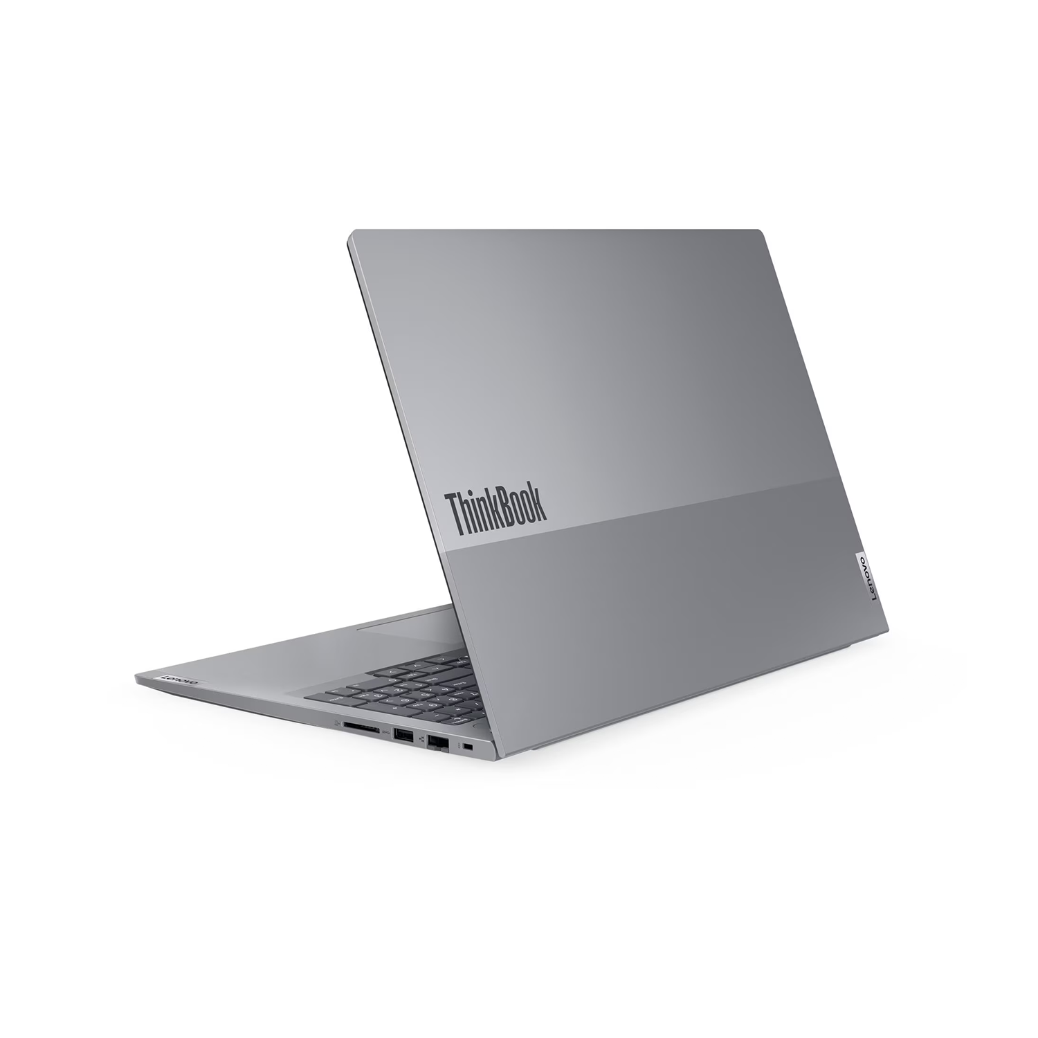 Gri bir Lenovo ThinkBook dizüstü bilgisayar açık. Klavye görünür. ThinkBook logosu kapakta. Arka plan beyaz.